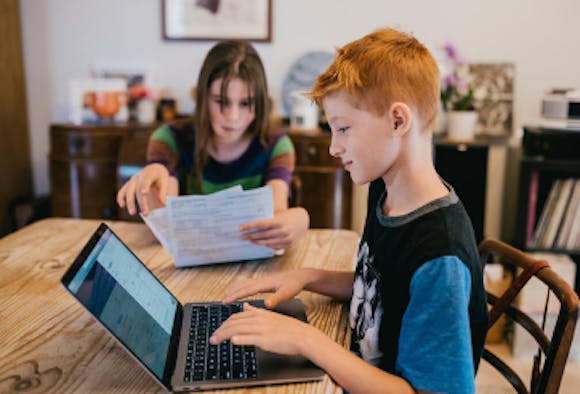 Boy using the ClimateClever home platform