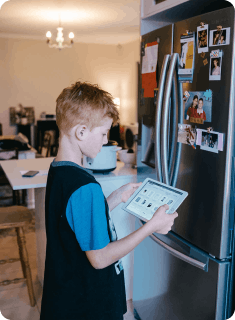 Little boy using the ClimateClever Home platform