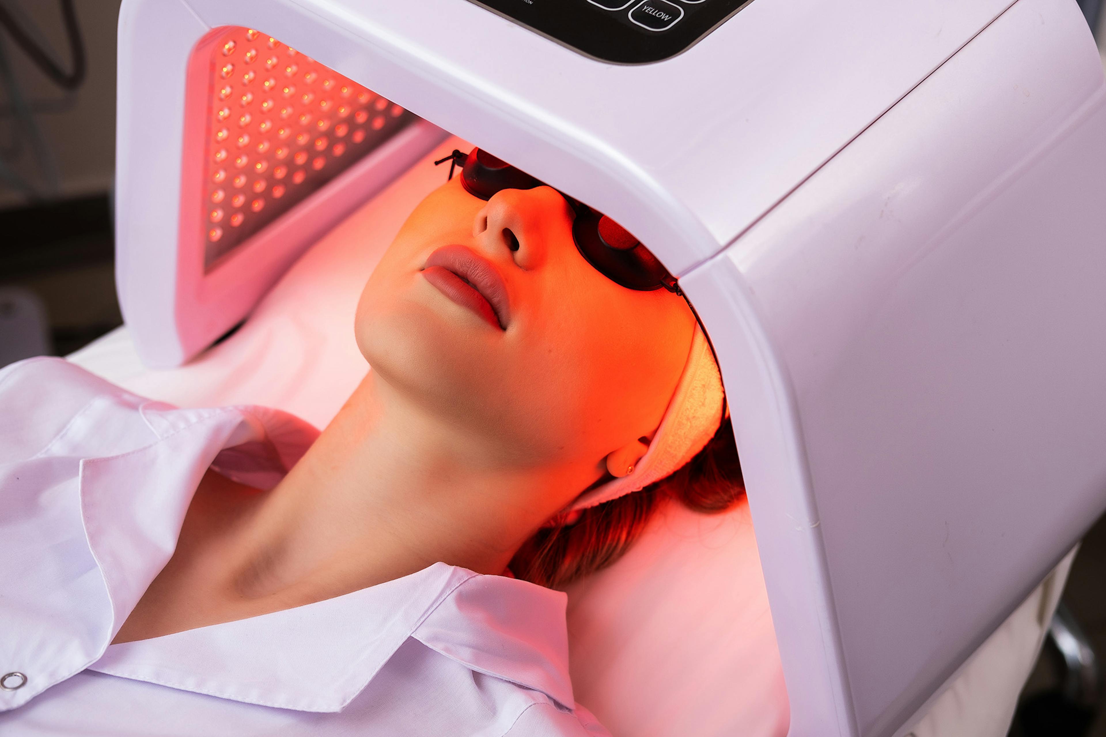 A female patient receiving Dermalux Flex LED Phototherapy