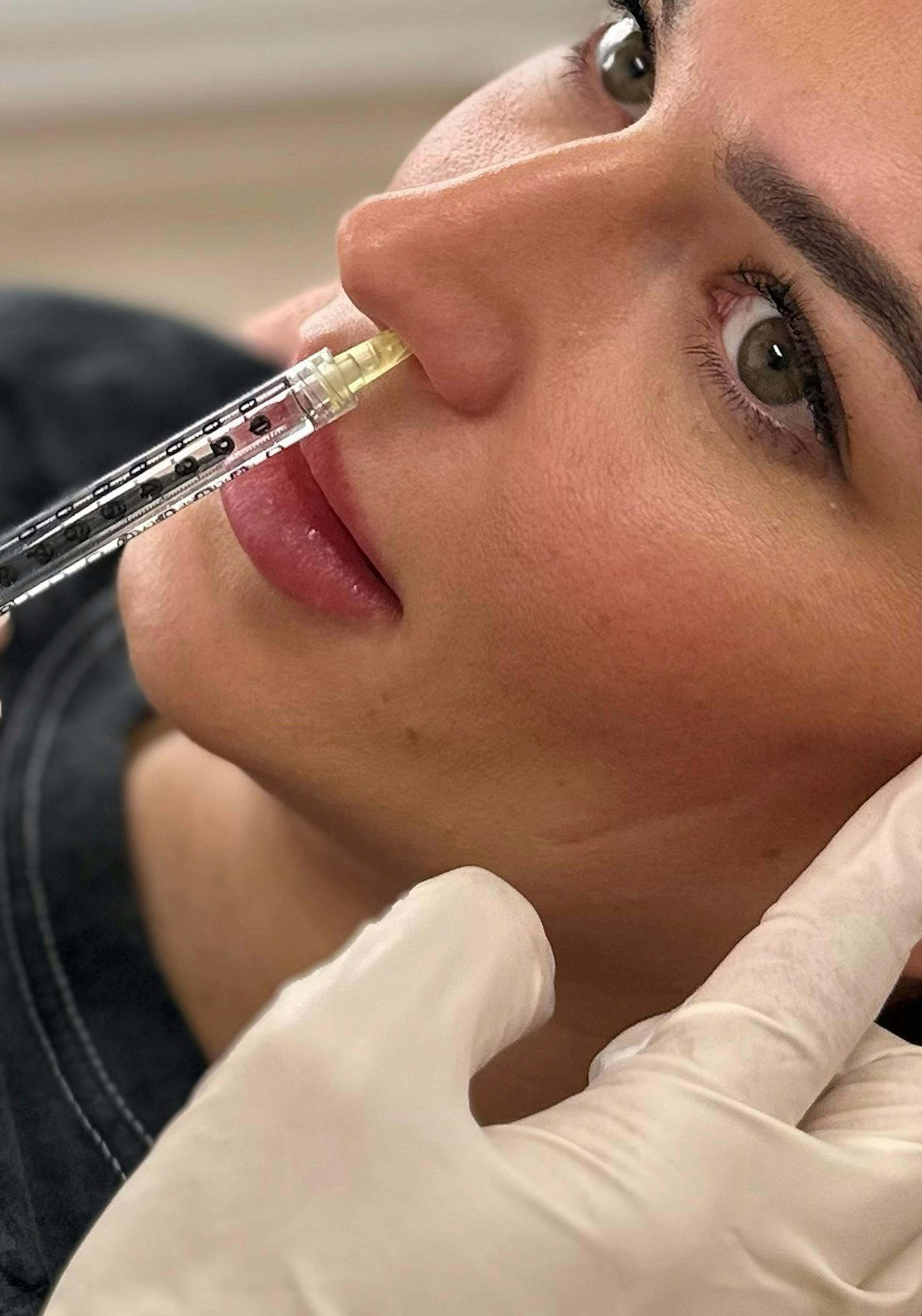 Haytox training being performed on a woman