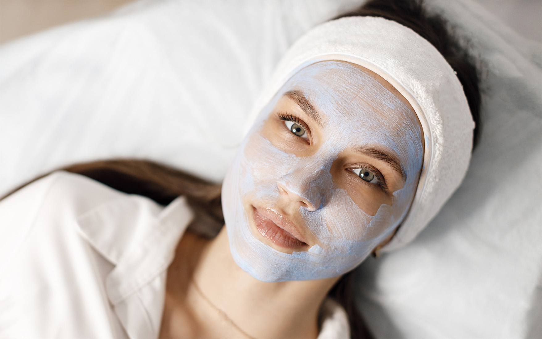 A female patient with Obagi Blue Peel on her face