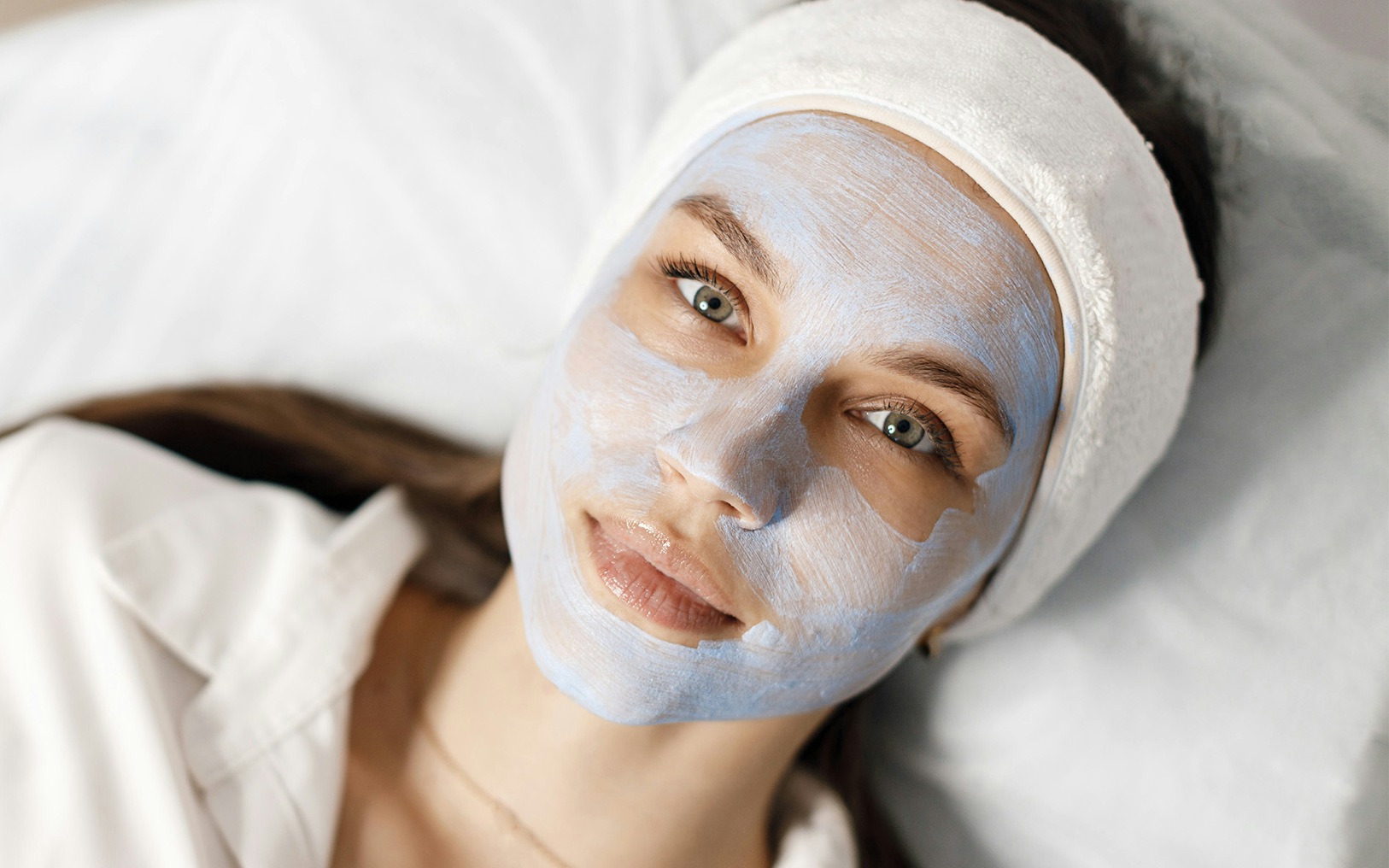 A female patient with Obagi Blue Peel on her face