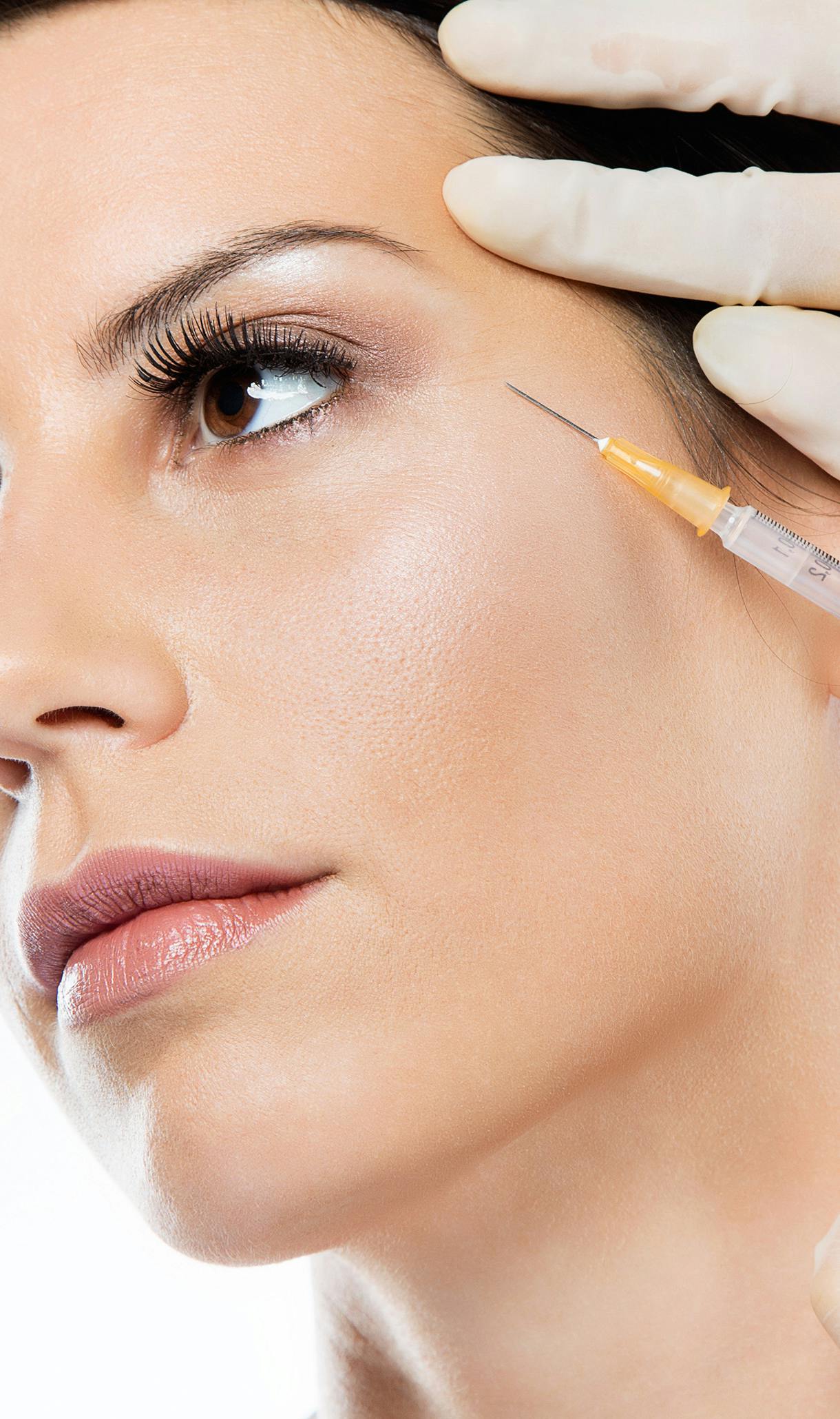 A female patient receiving medical botox