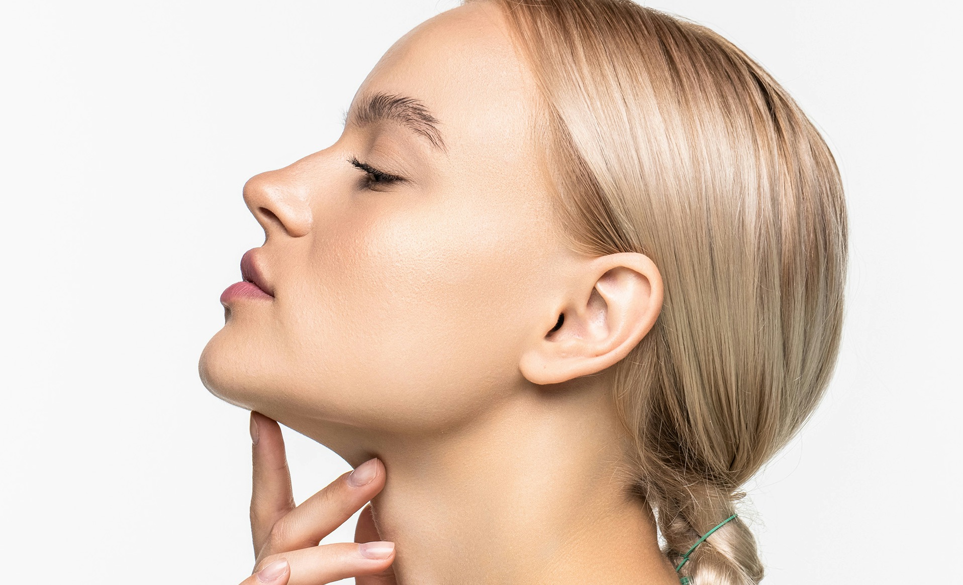 beautiful woman touching her face