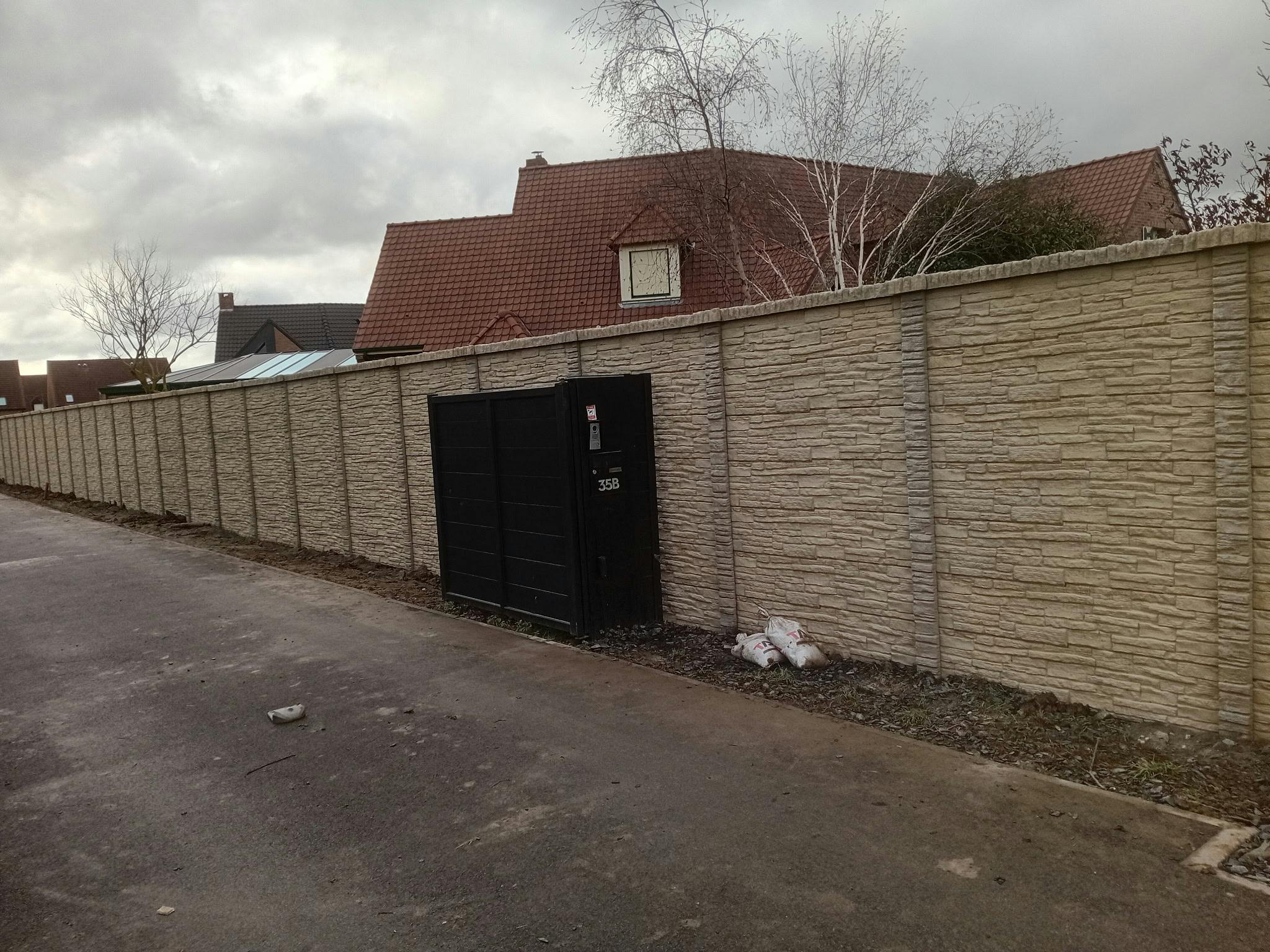pose d'une clôture béton à Carvin