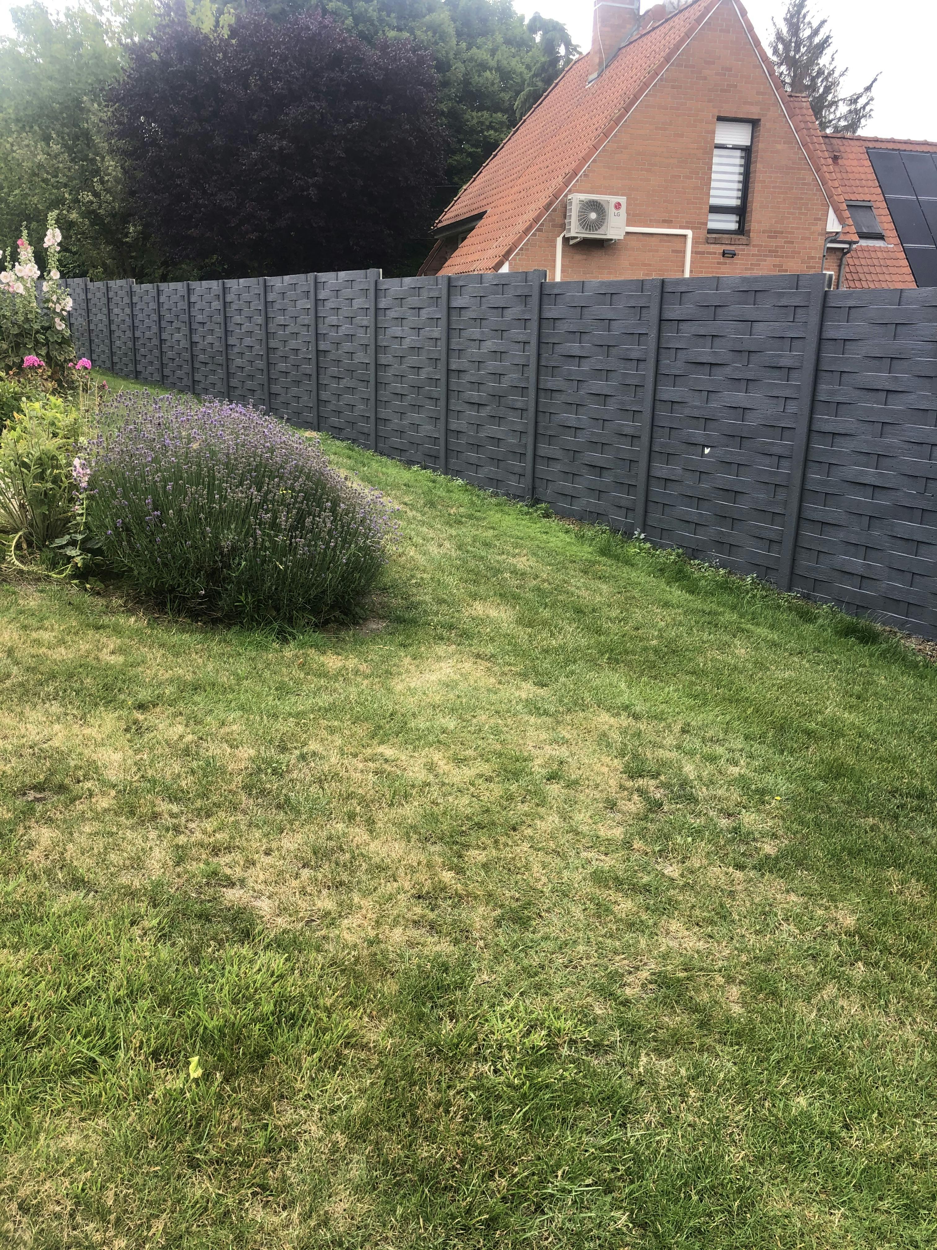 Clôture béton imitation bois installée à Lille
