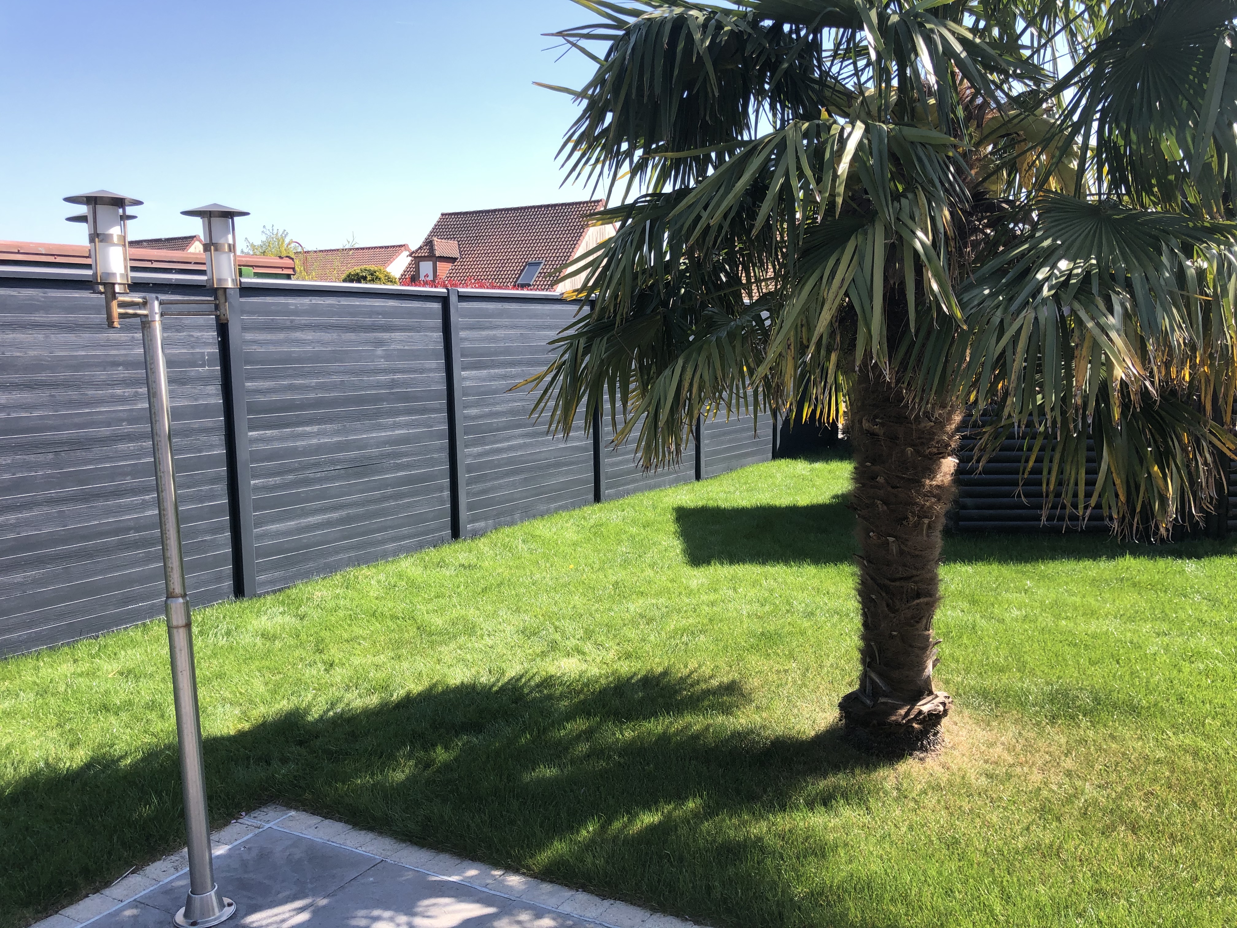 Clôture béton imitation bois installée à Lille