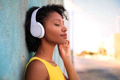 woman listening to instrumental music