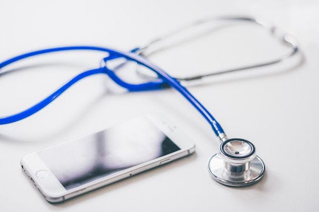 stethoscope and a cell phone