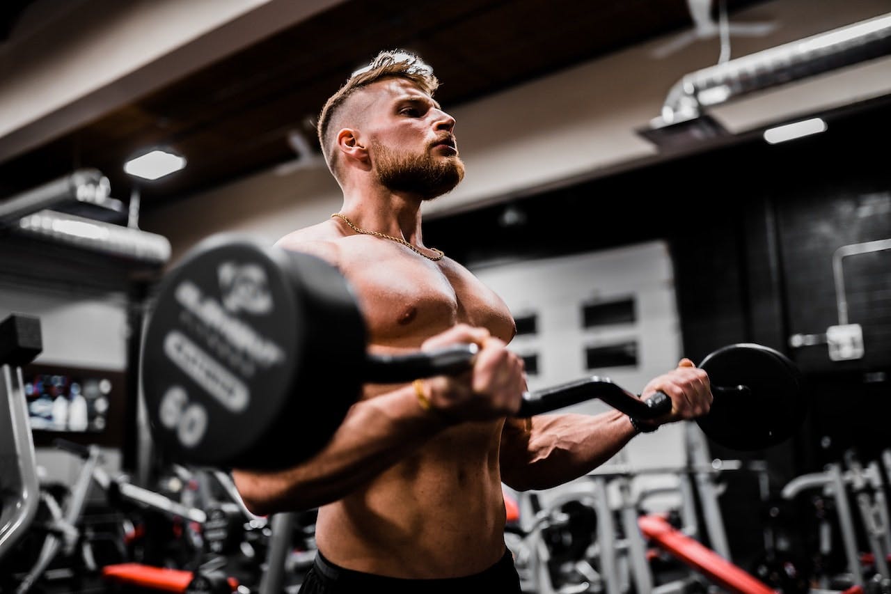 man lifting weights