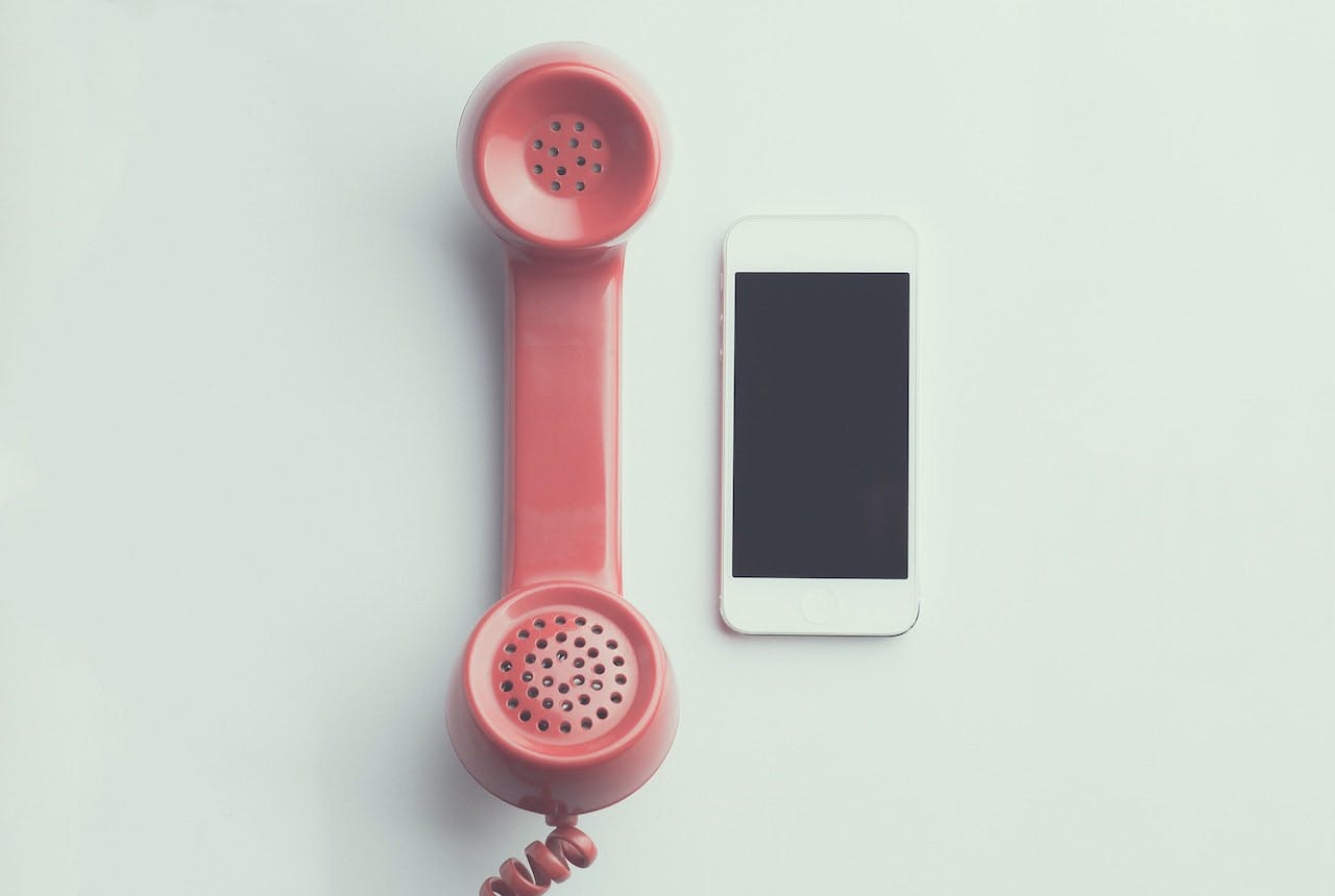telephone and a smart phone