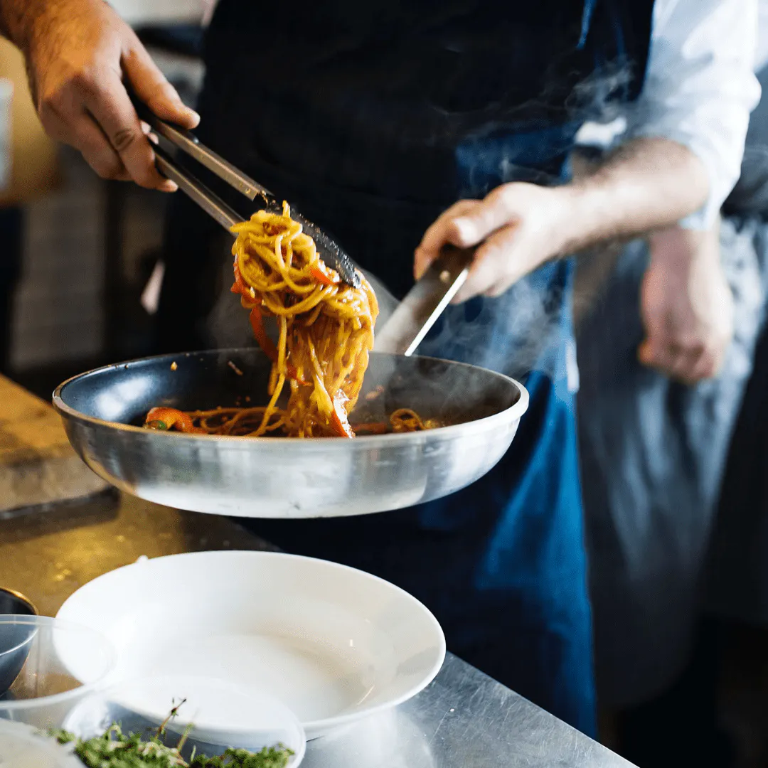 Cooking inside Foodstars Peckham commercial kitchen