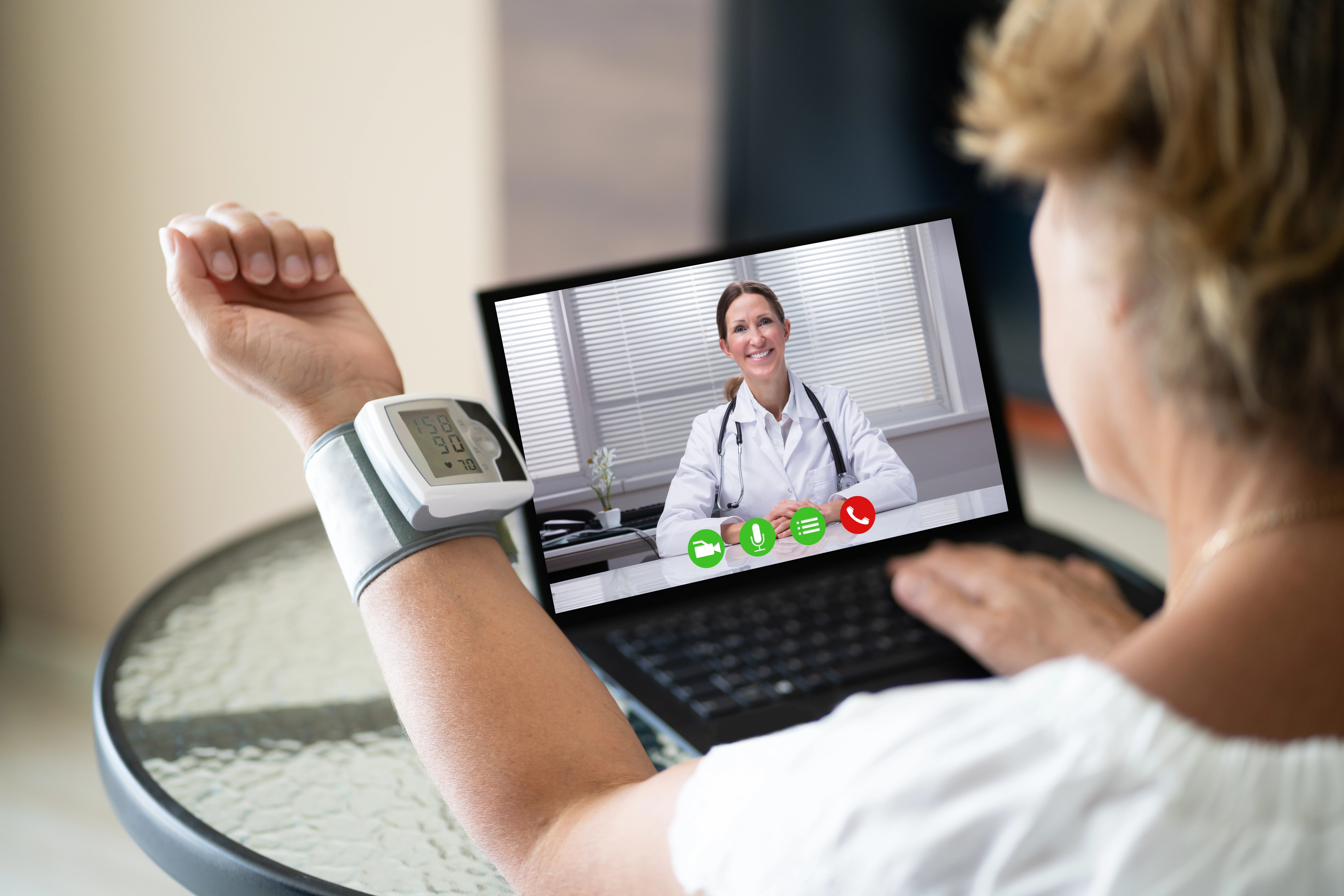 A patient is doing a telehealth visit or virtual urgent care.