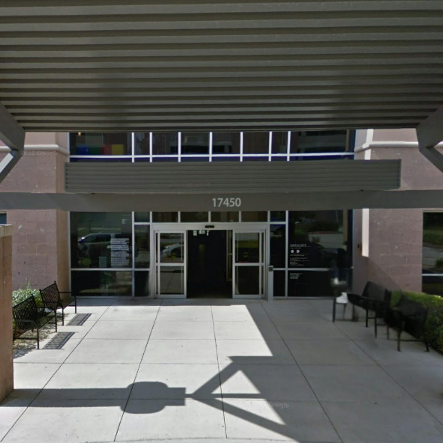 CLS Health Rheumatology Associates Woodlands Clinic entrance.