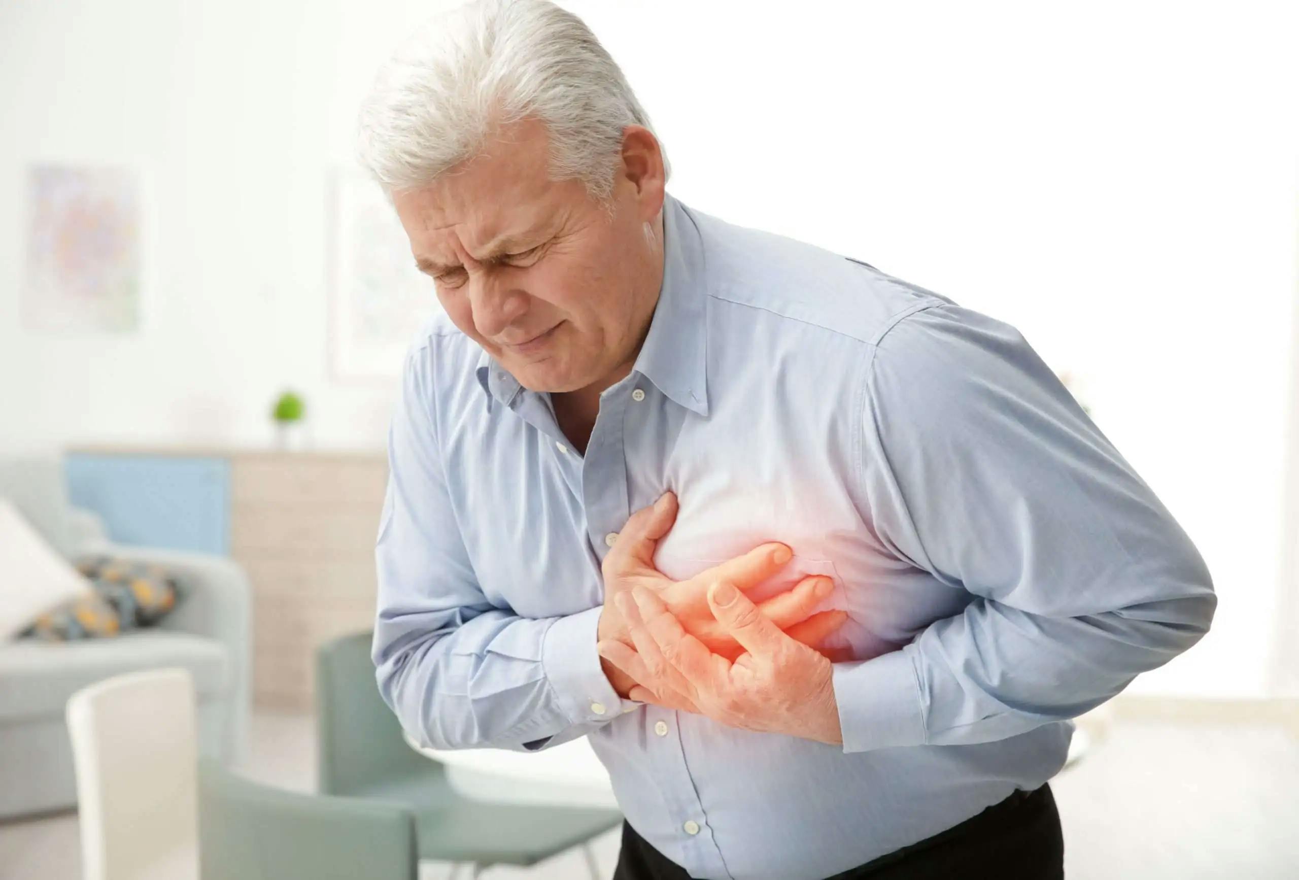 Man clutching his chest