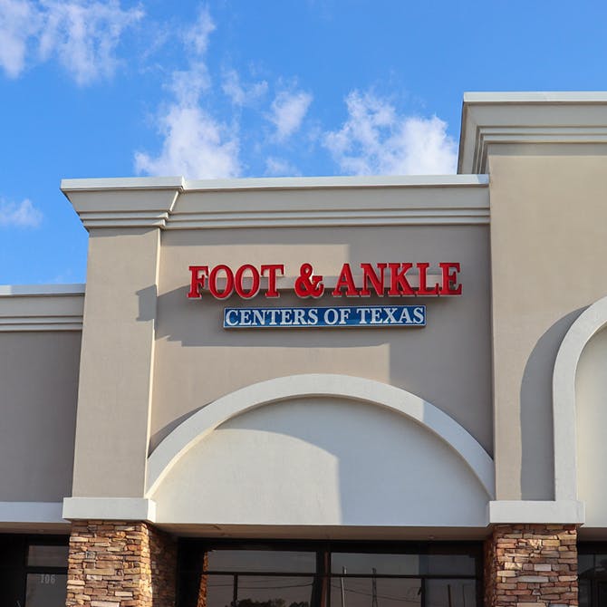Exterior view of CLS Health Podiatry Associates - League City Gulf Freeway, featuring a welcoming entrance and clear signage for foot and ankle care services.