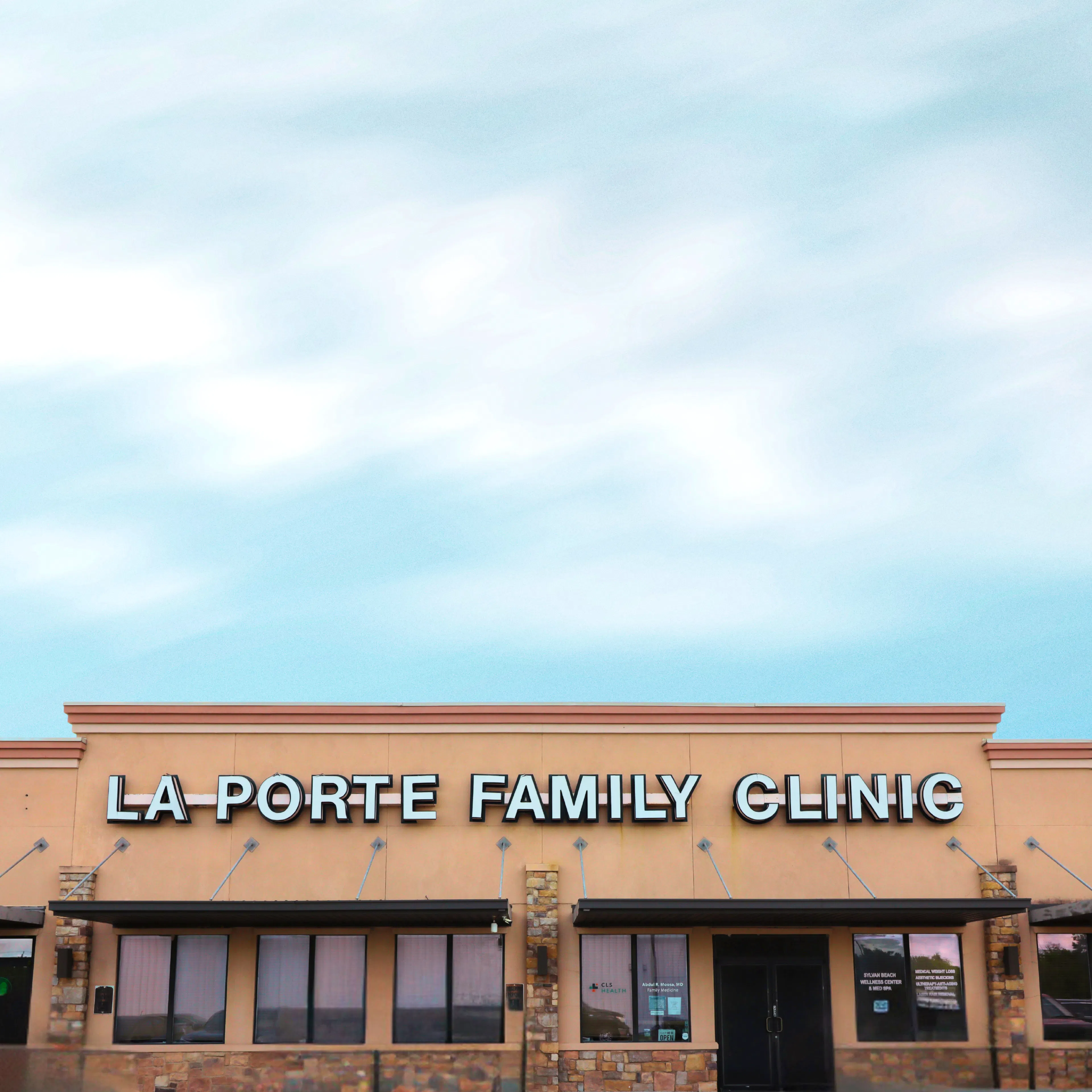 Exterior view of CLS Health Primary Care Associates - La Porte, a clinic treating common illnesses and chronic conditions.