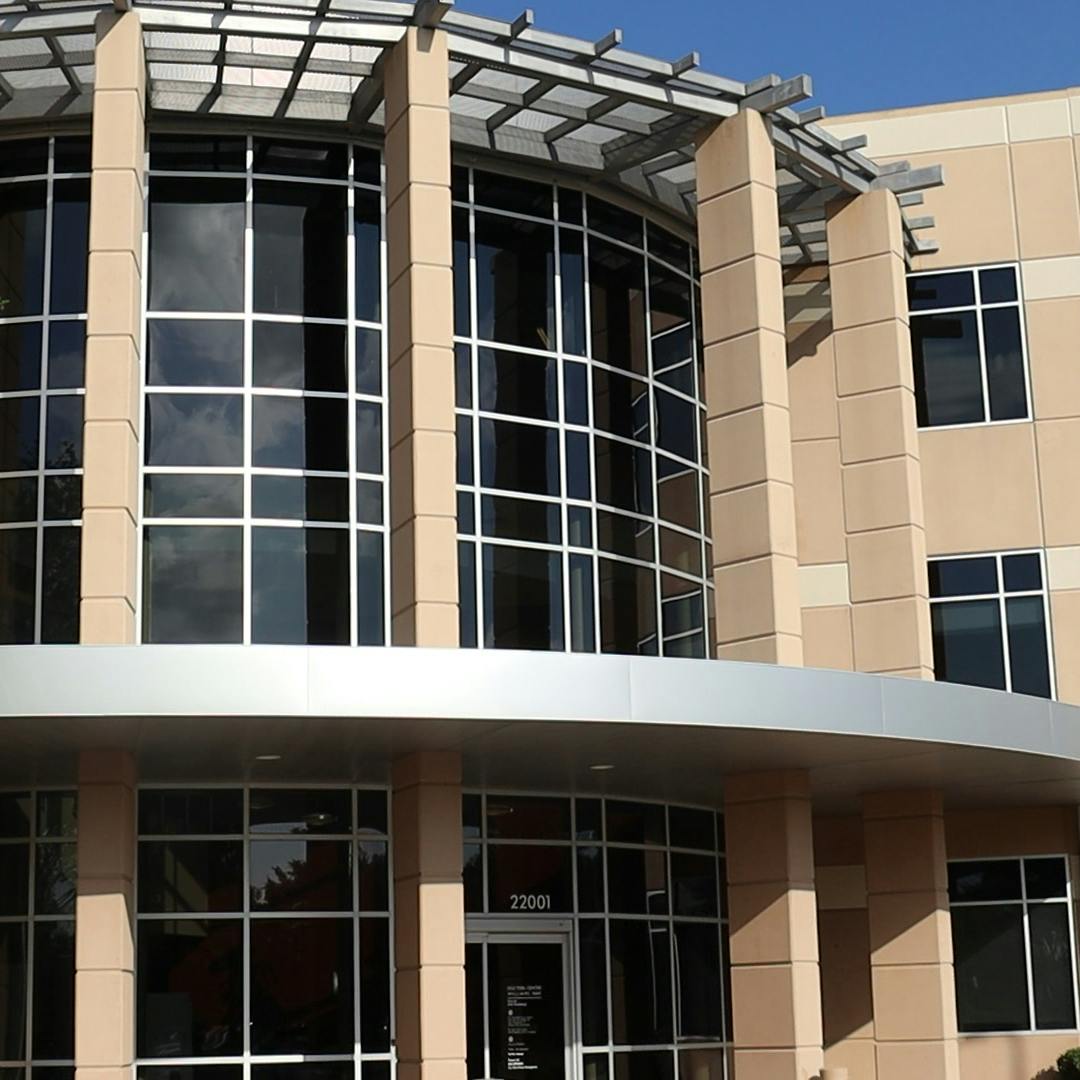 Exterior view of CLS Health Primary Providers - Richmond, open for treating common illnesses and chronic conditions.