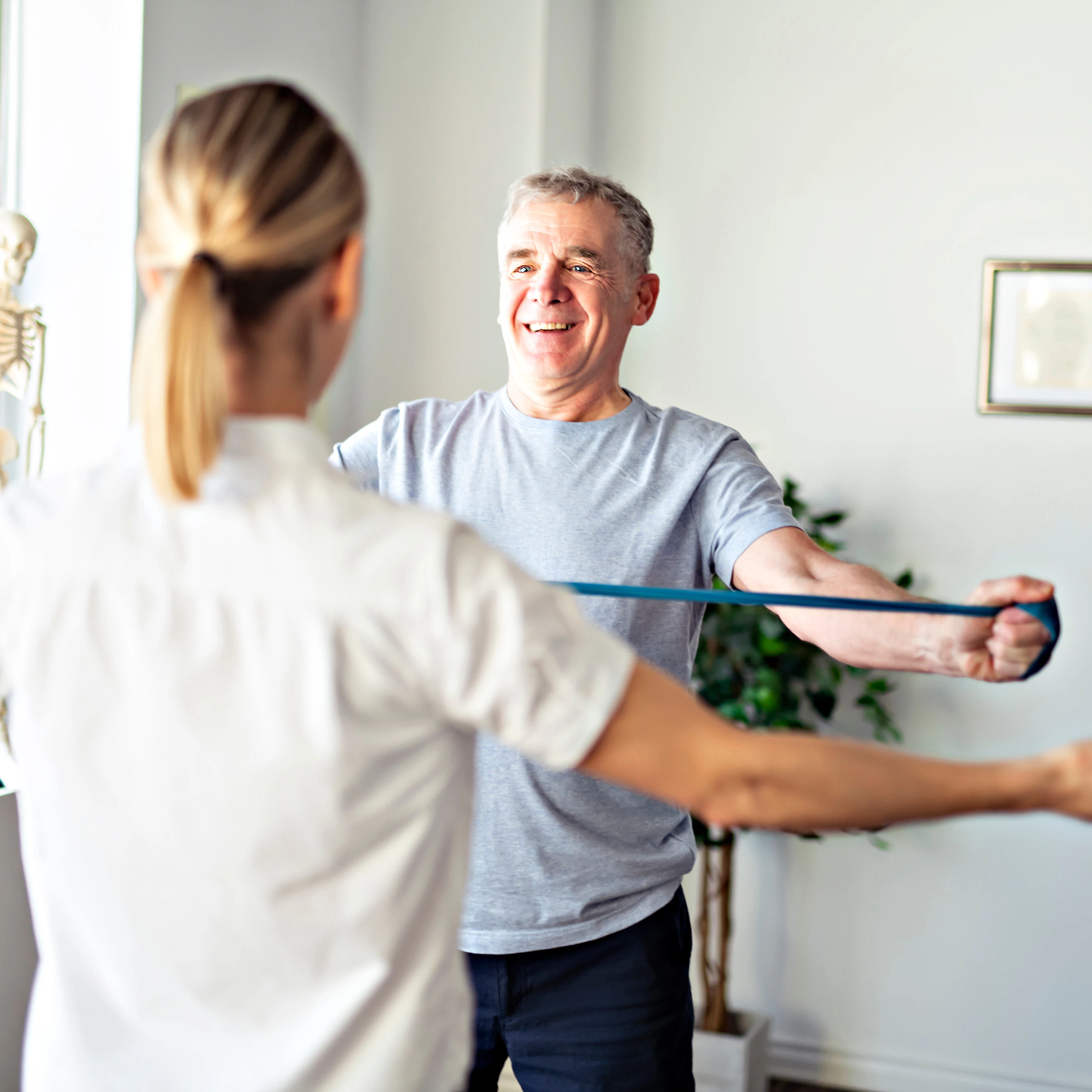 Patient receiving personalized care from a physical medicine and rehabilitation specialist at CLS Health, focused on improving mobility and managing pain.