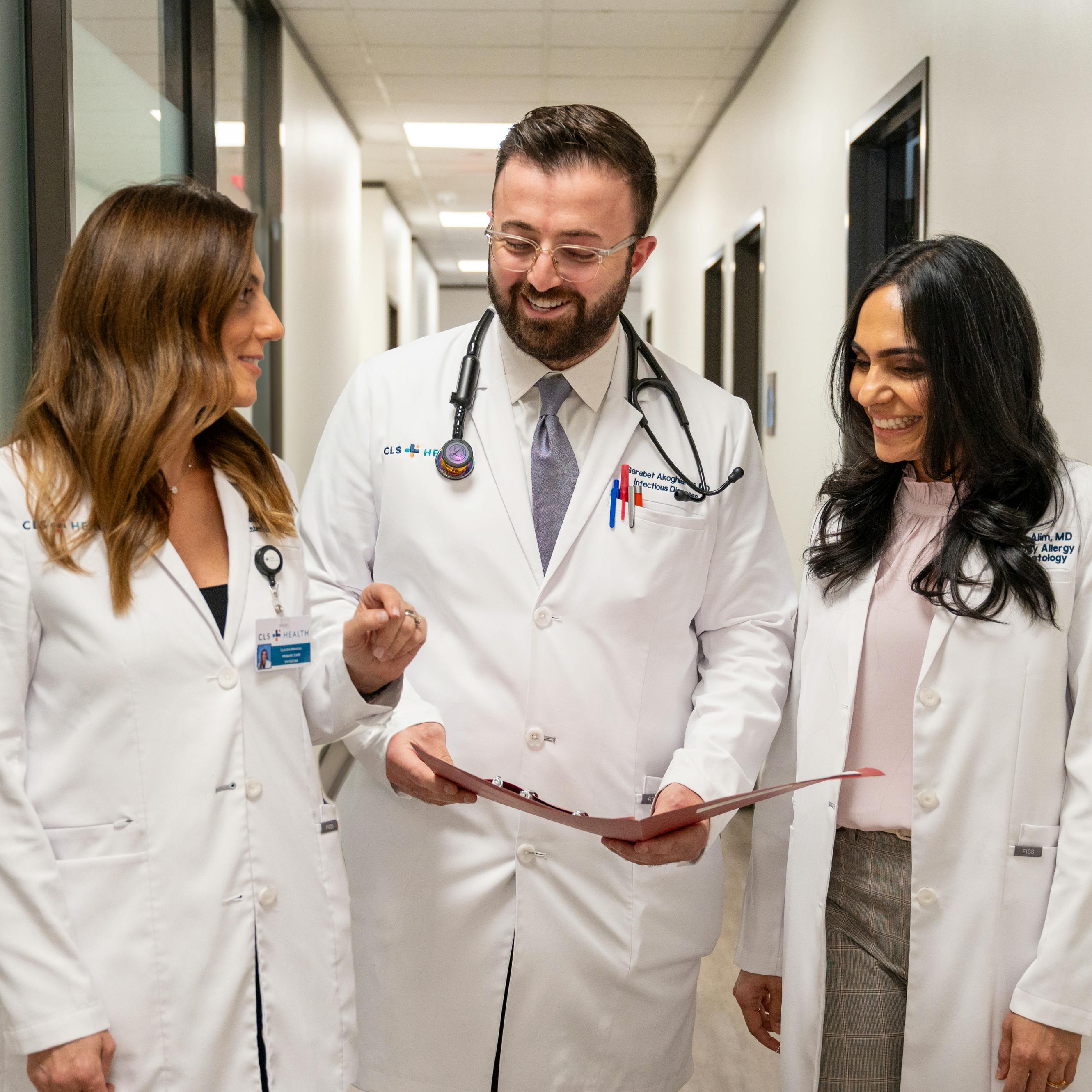 A group of CLS Health doctors posing together, showcasing teamwork, collaboration, and dedication to patient care.