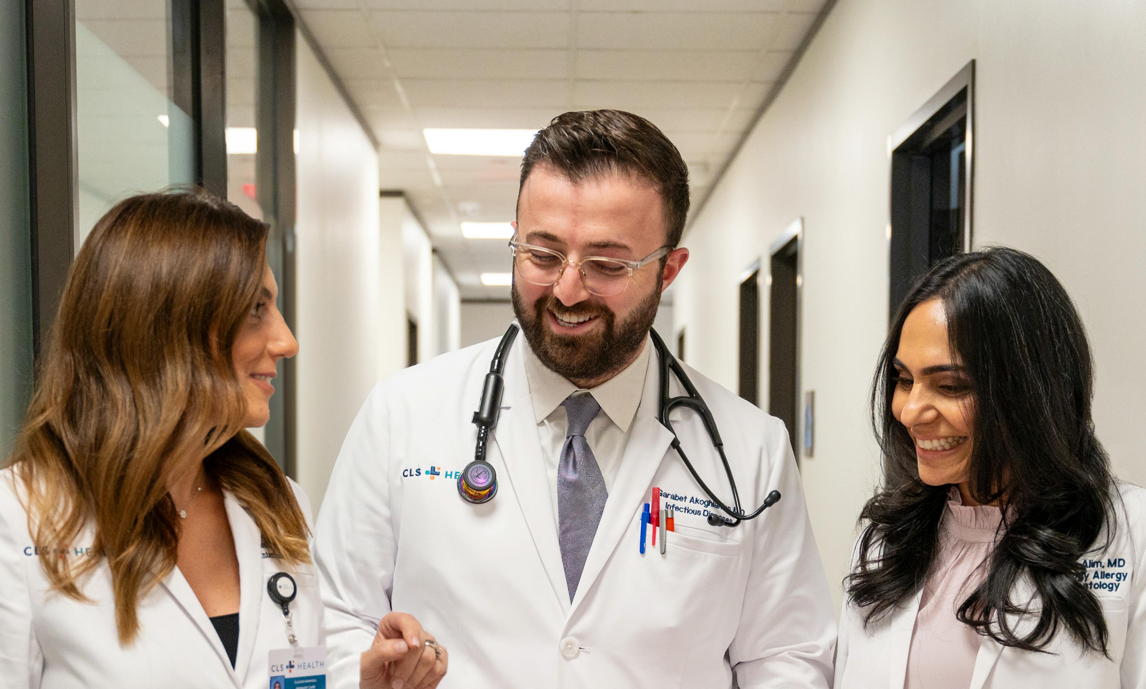 A group of CLS Health doctors posing together, showcasing teamwork, collaboration, and dedication to patient care.