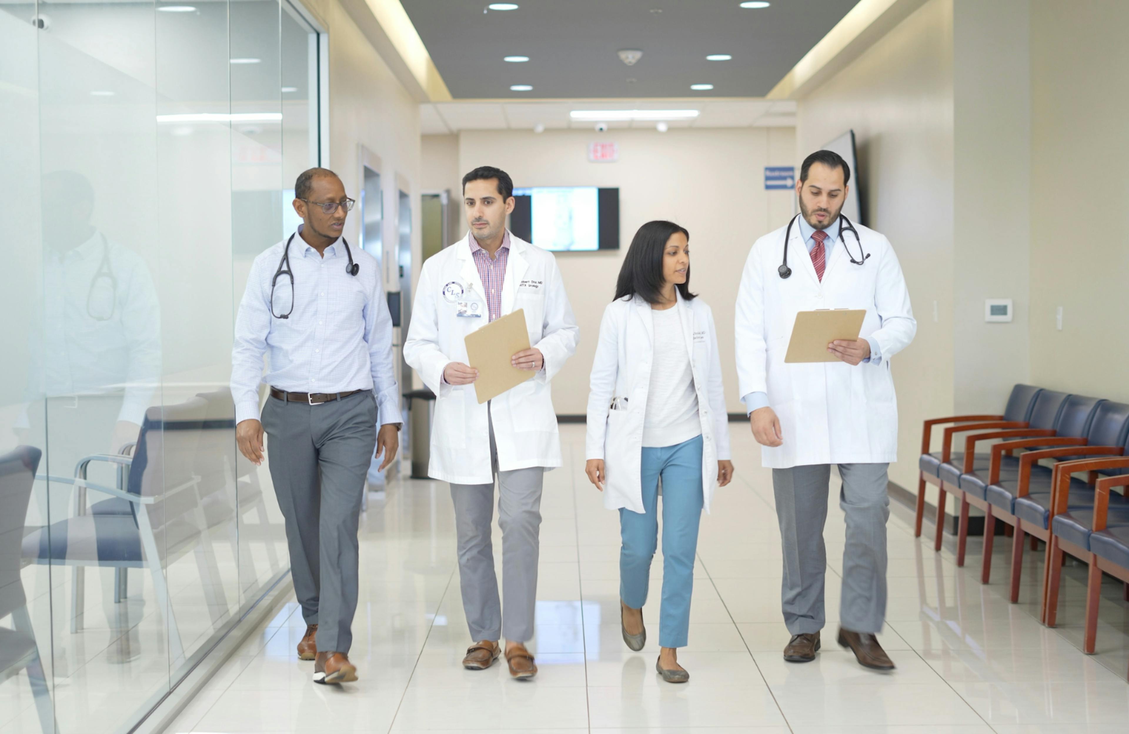 A group of CLS Health doctors posing together, showcasing teamwork, collaboration, and dedication to patient care.