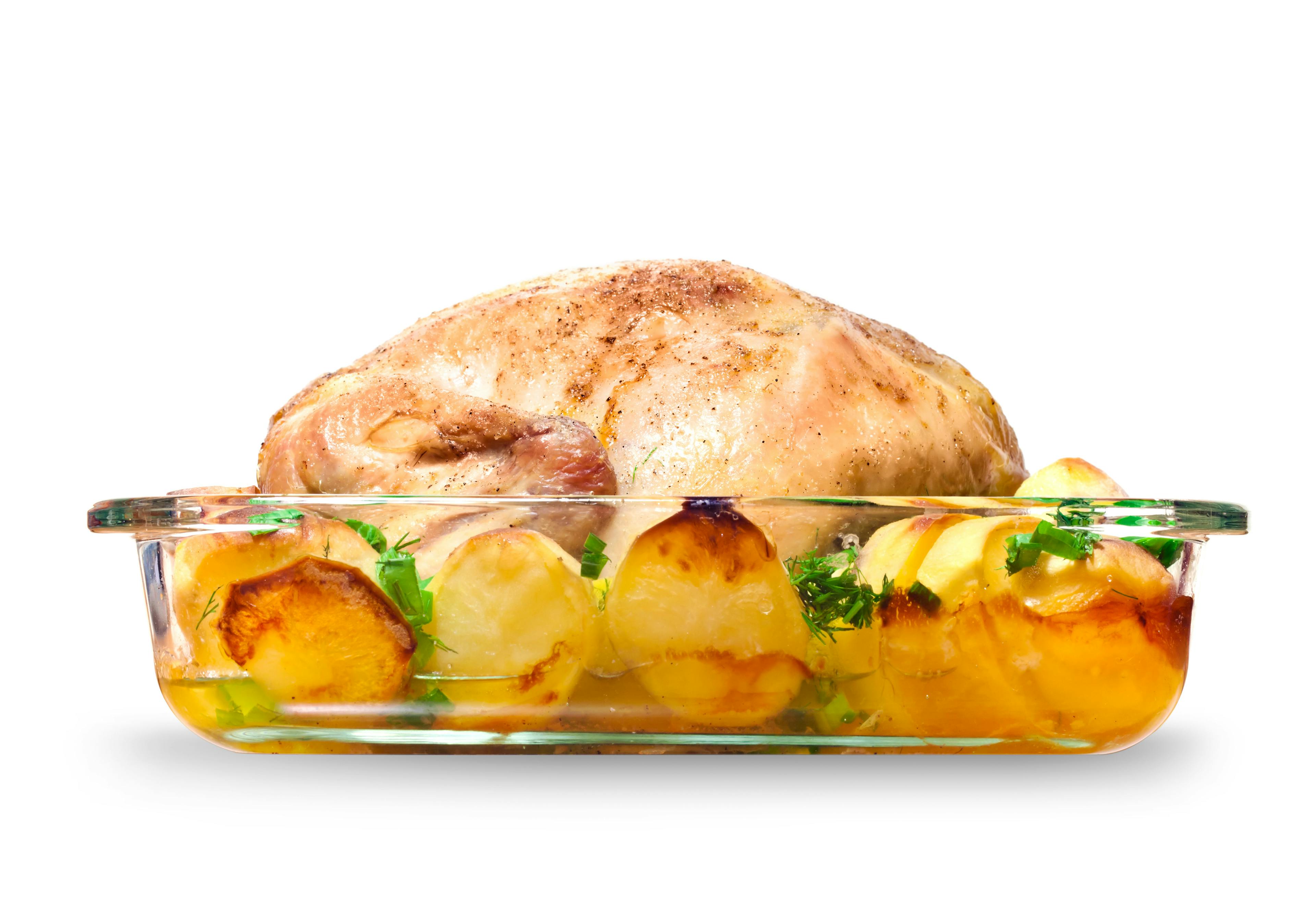 Whole chicken baked with potatoes.