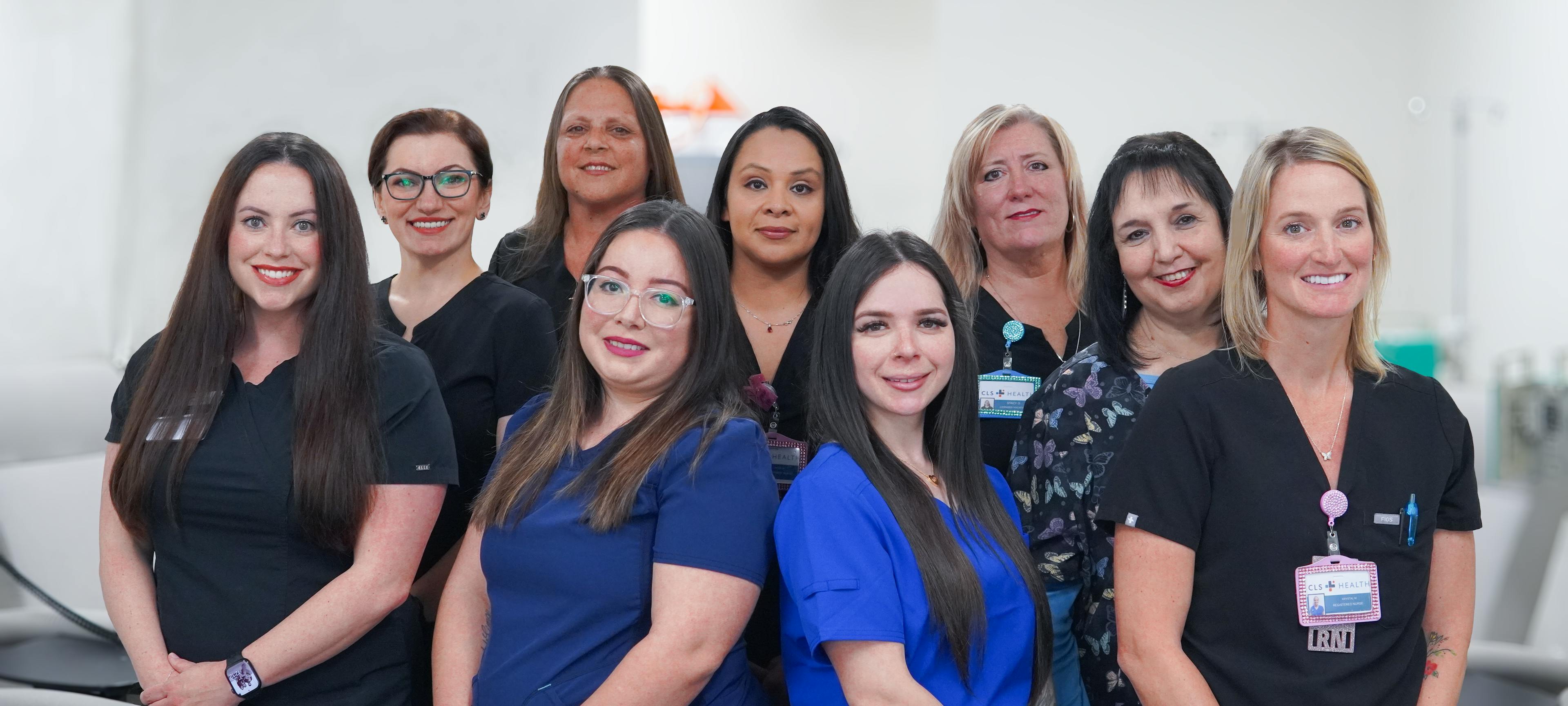Staff from the CLS Health Infusion Center posing together for a photo, showcasing their teamwork and dedication to patient care.