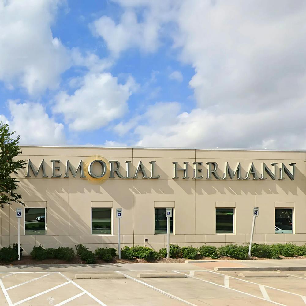 Exterior view of CLS Health Pain Management Associates in Pearland, Texas, featuring a modern medical building.
