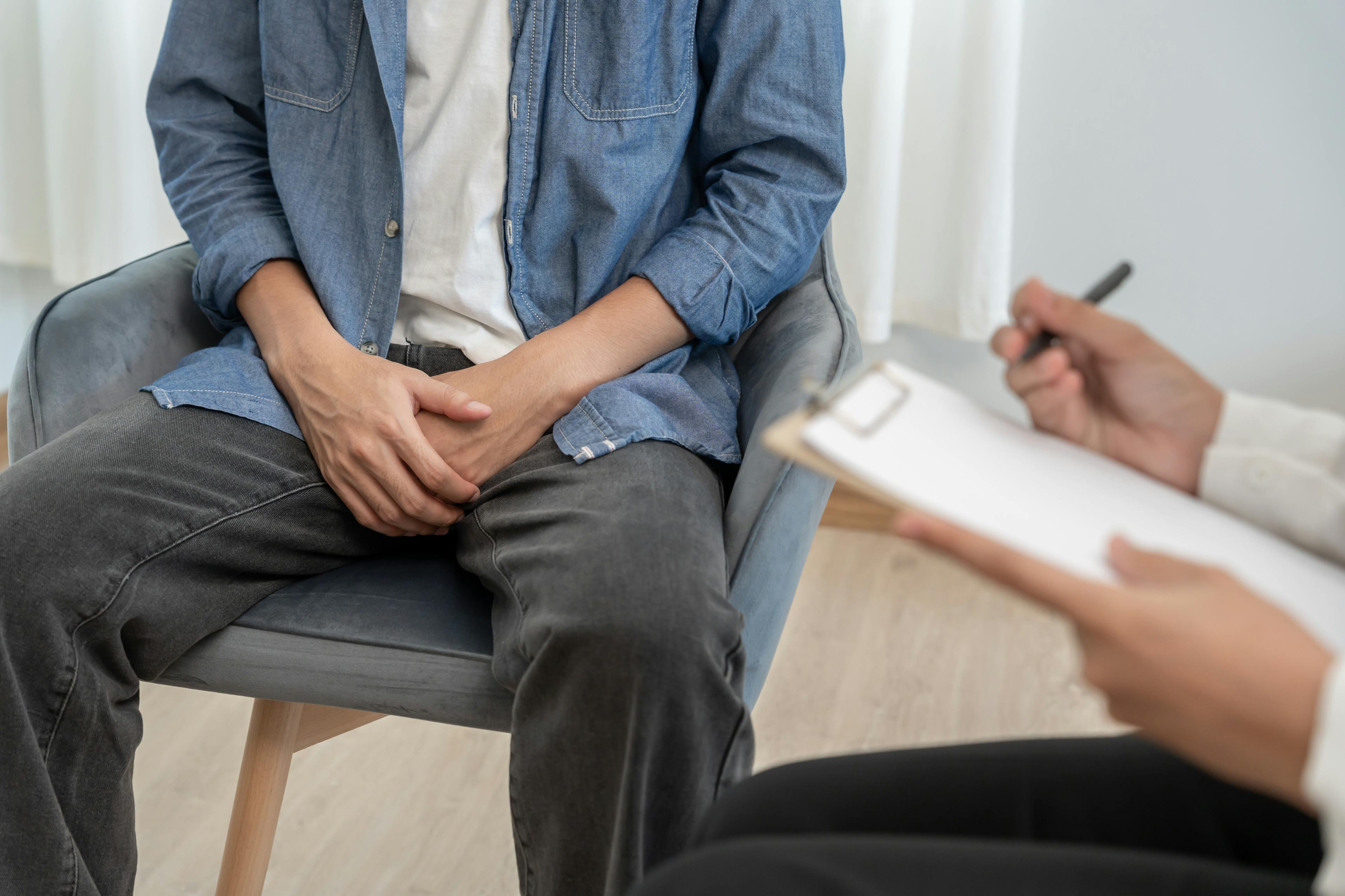Man consulting doctor about prostate health.