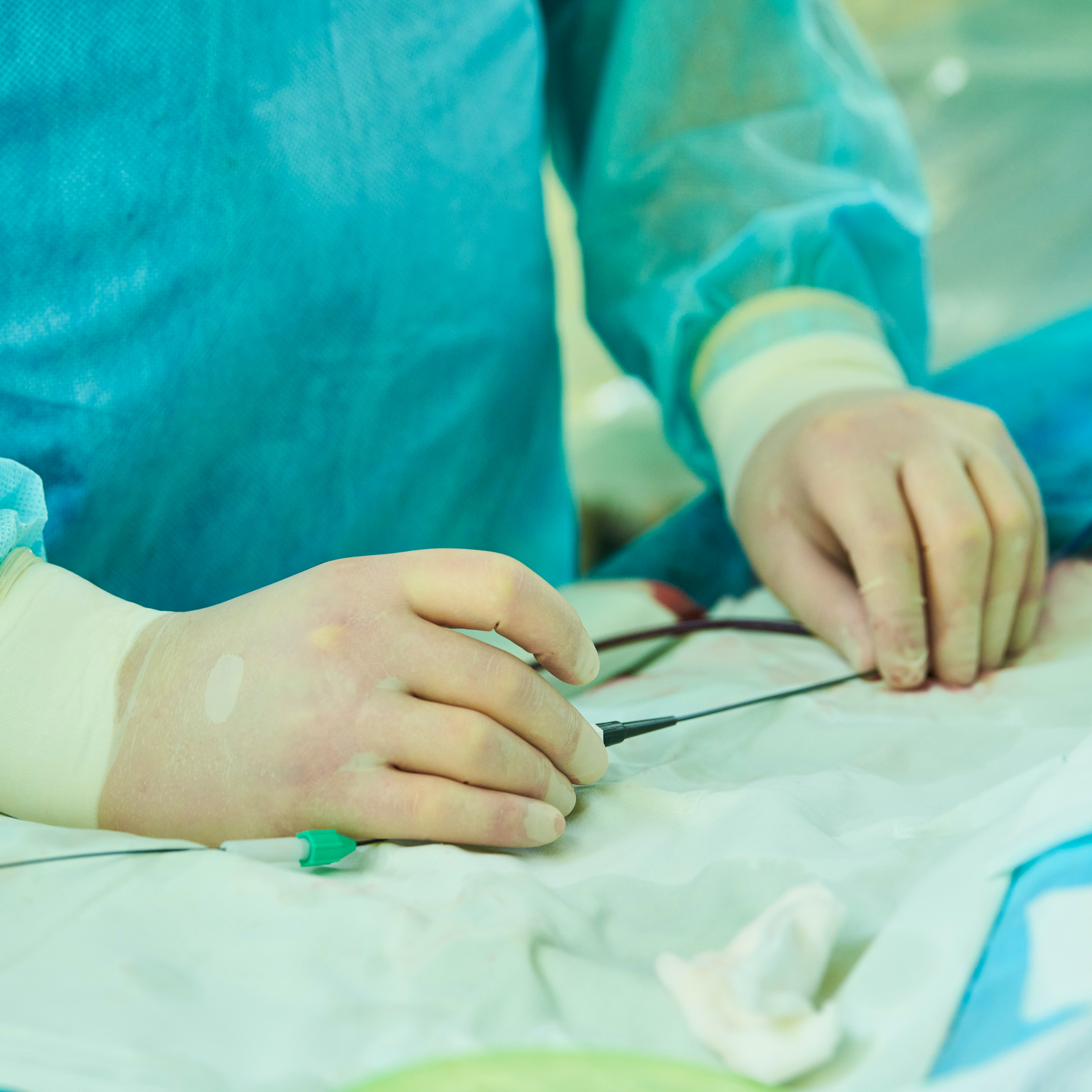 A medical provider is holding sterilized tools.