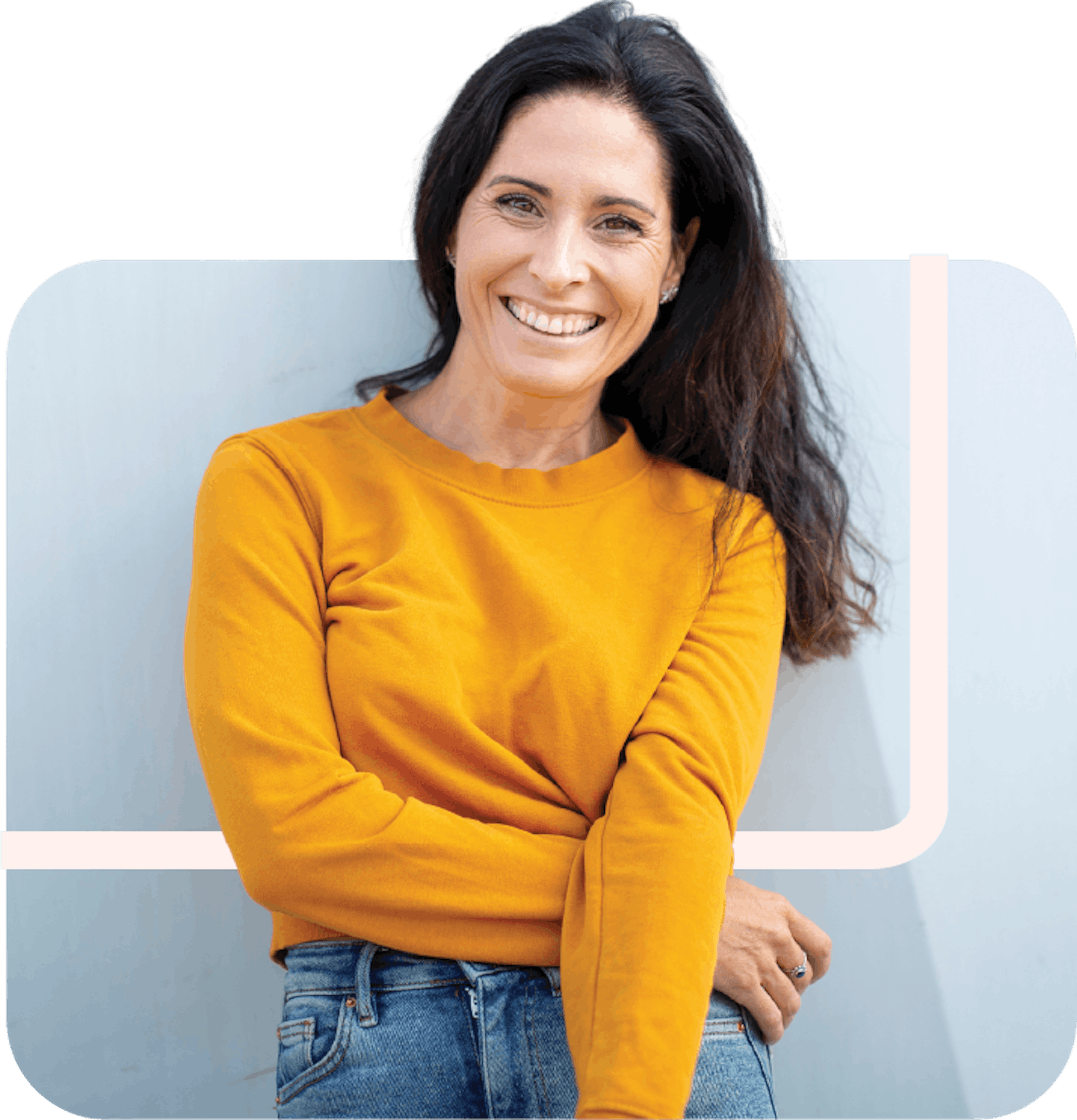 Portrait of smiling woman posing outdoors in city.