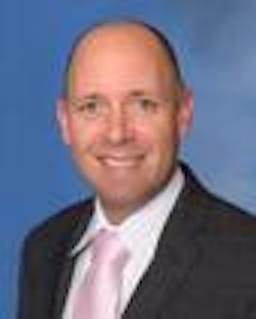 Dr. John G. Knecht III, medical oncologist, posing for his headshot. 