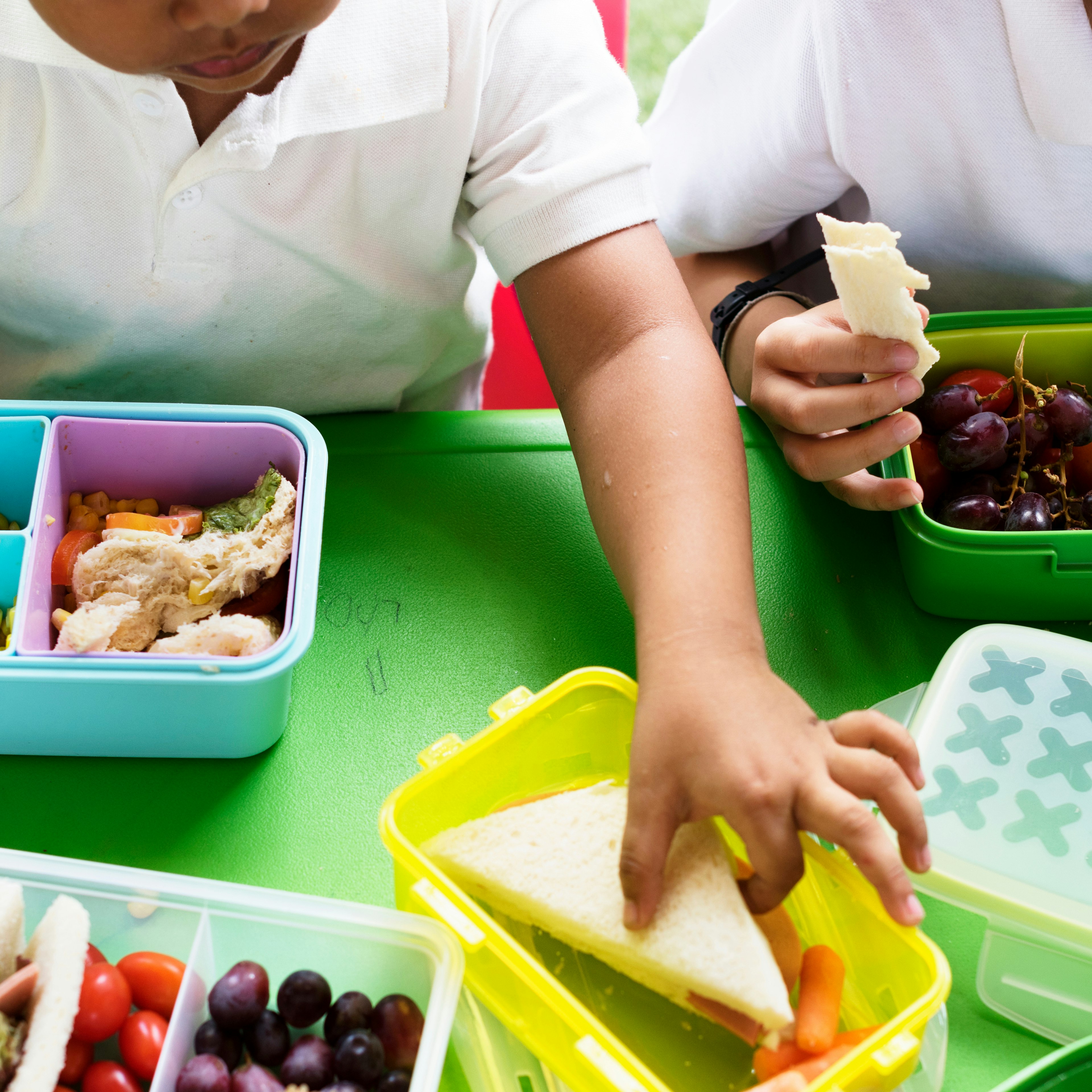 Kids are eating their nutritious school lunches. 