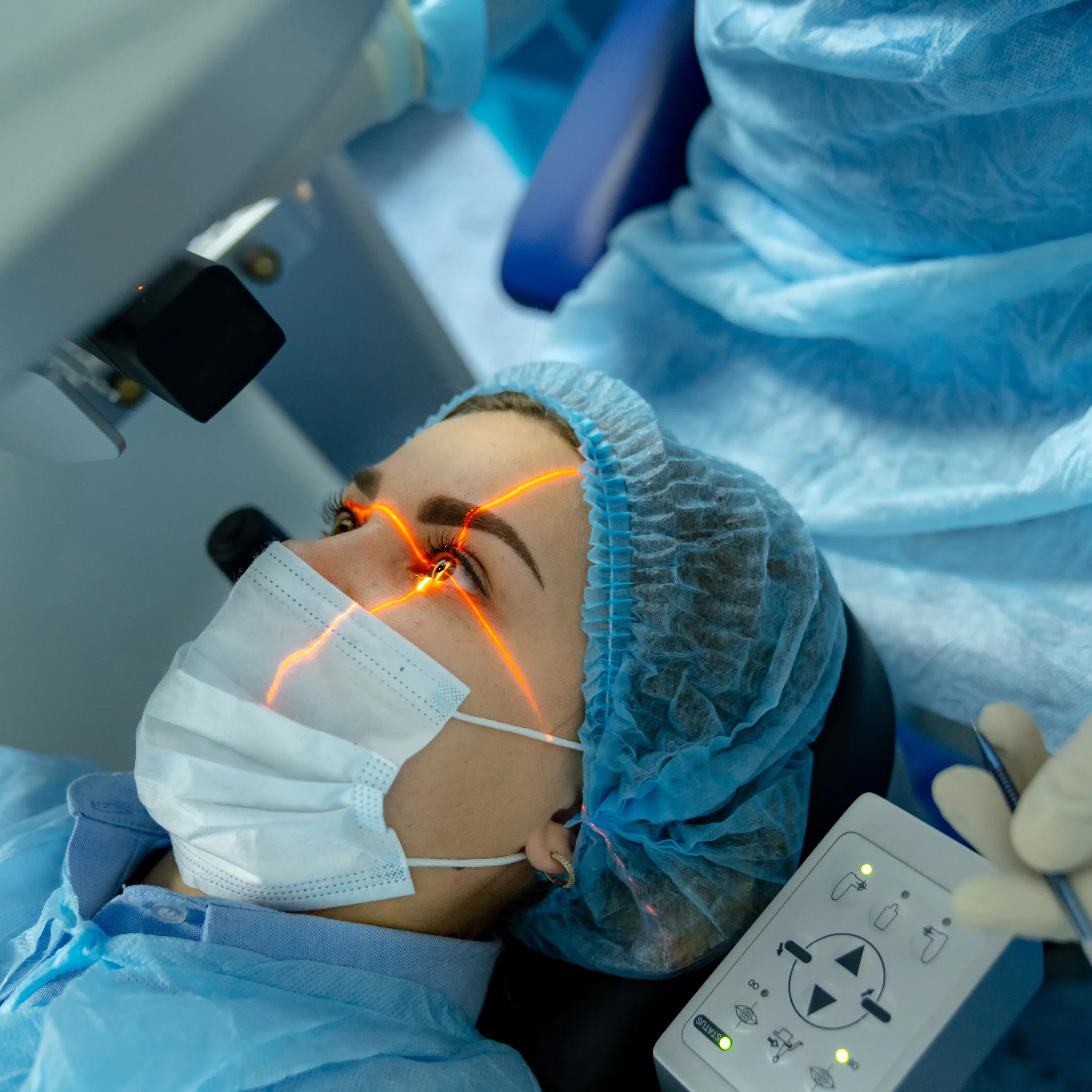 A patient is receiving laser eye surgery (PRK).