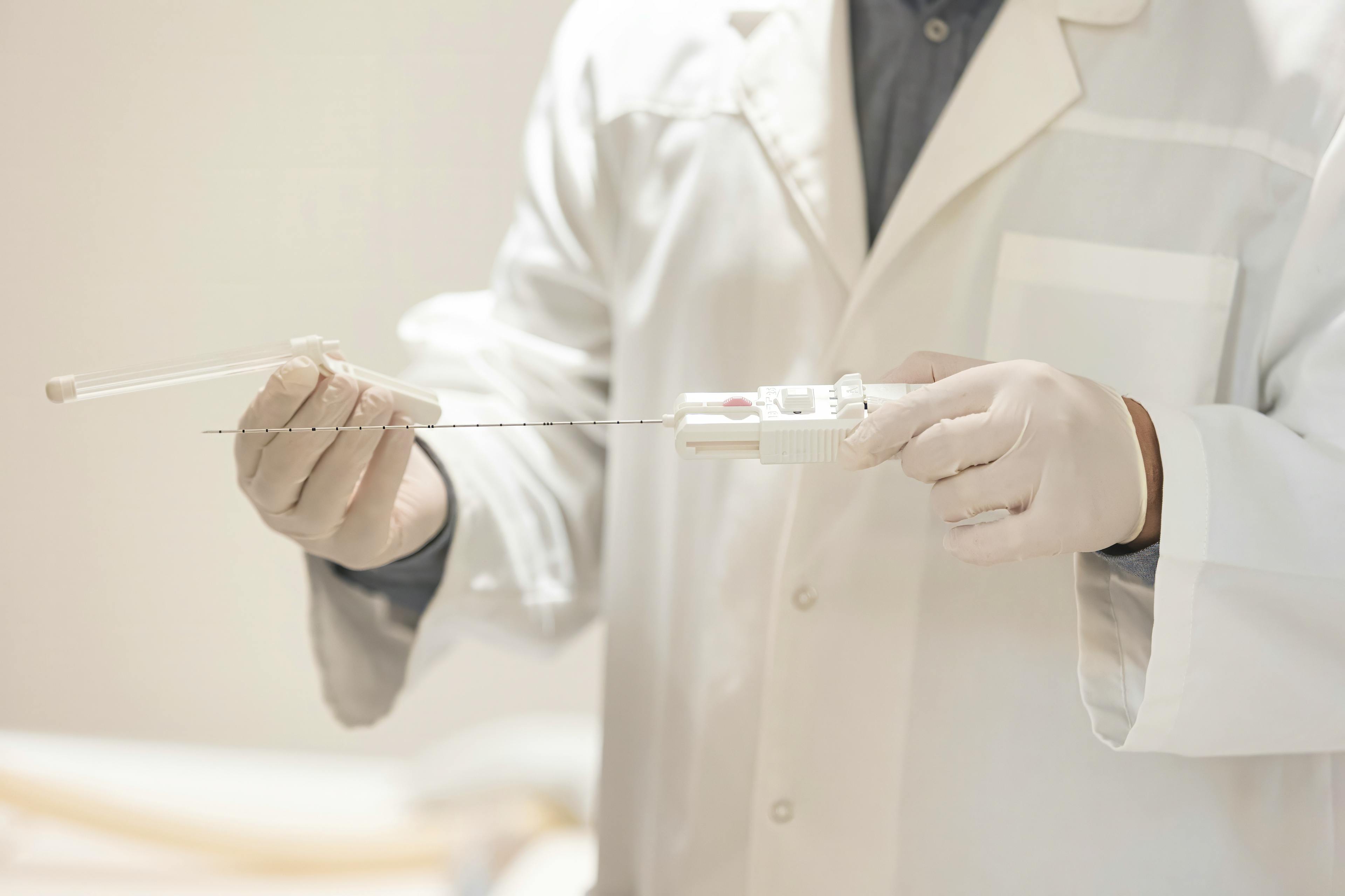 Doctor holding Prostate Biopsy Needle