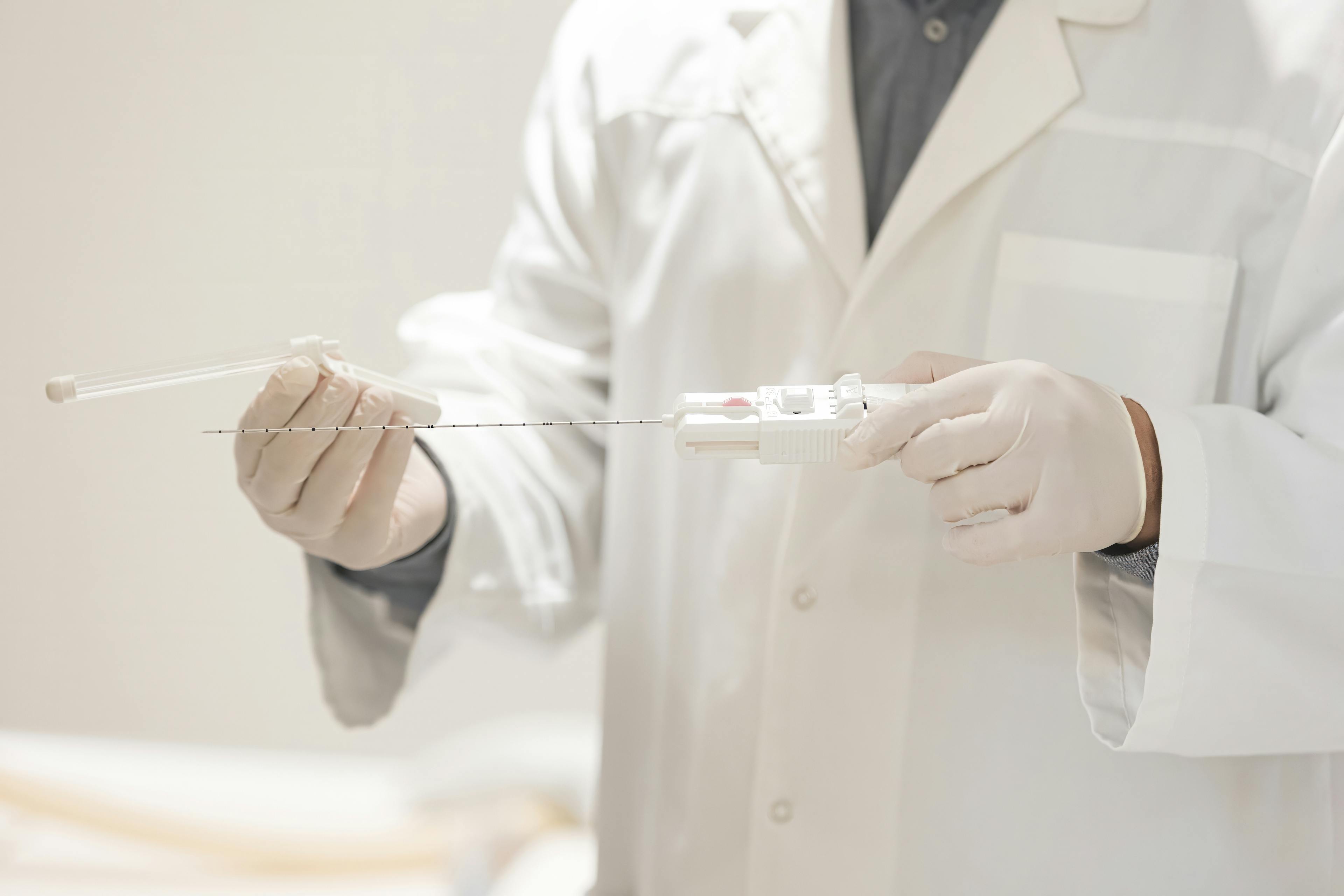 Doctor holding Prostate Biopsy Needle