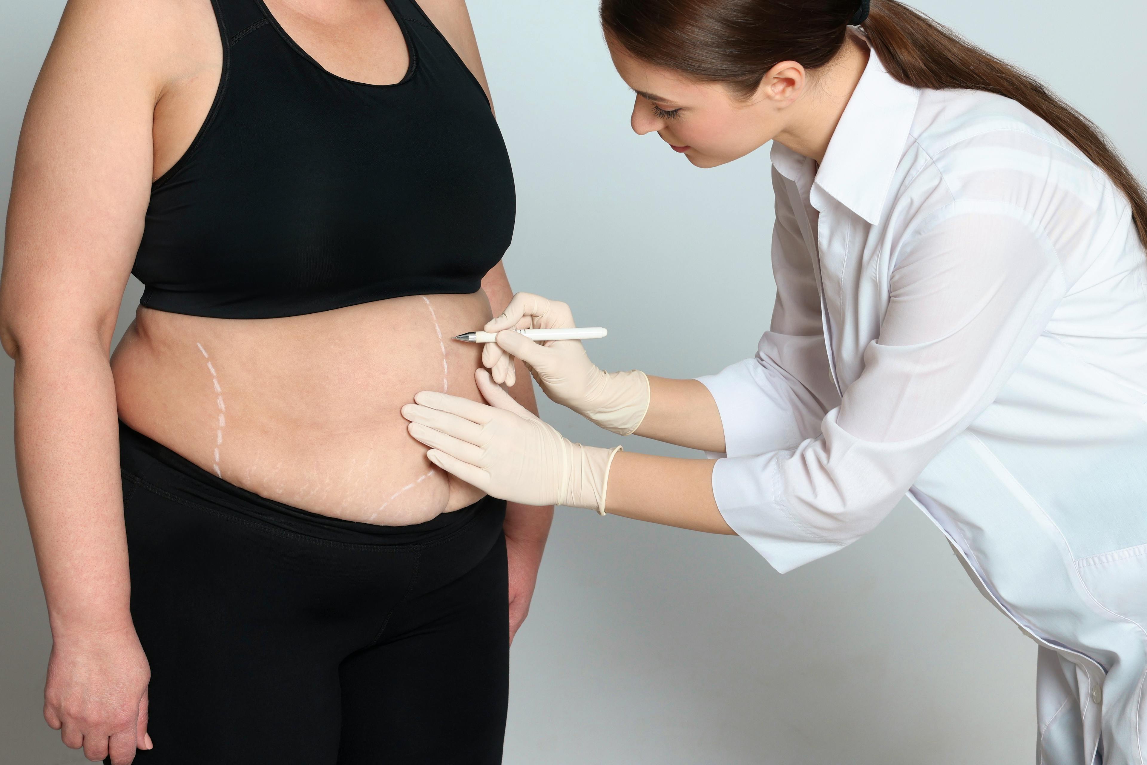 Woman going into pre-operation meeting with doctor