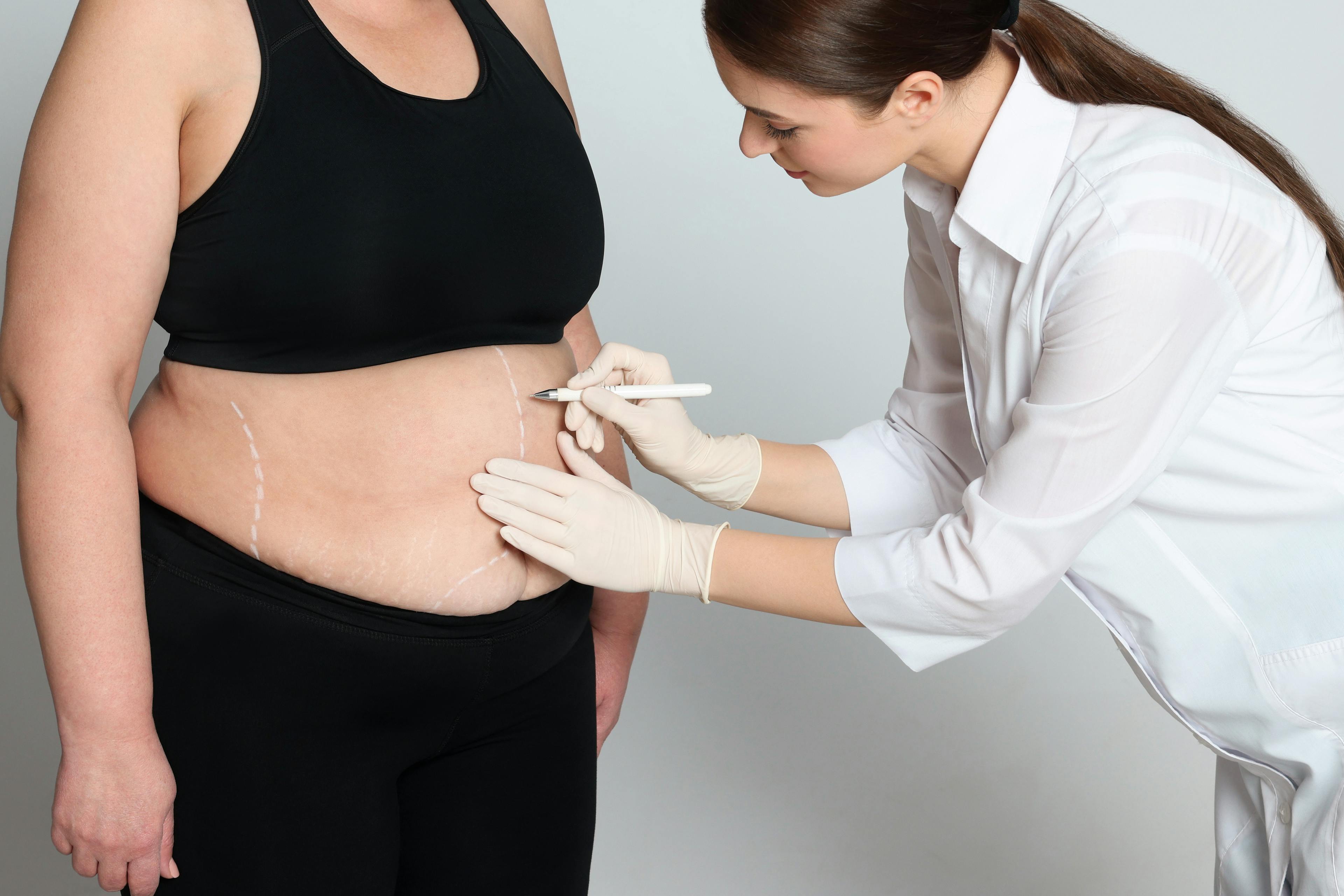 Woman going into pre-operation meeting with doctor