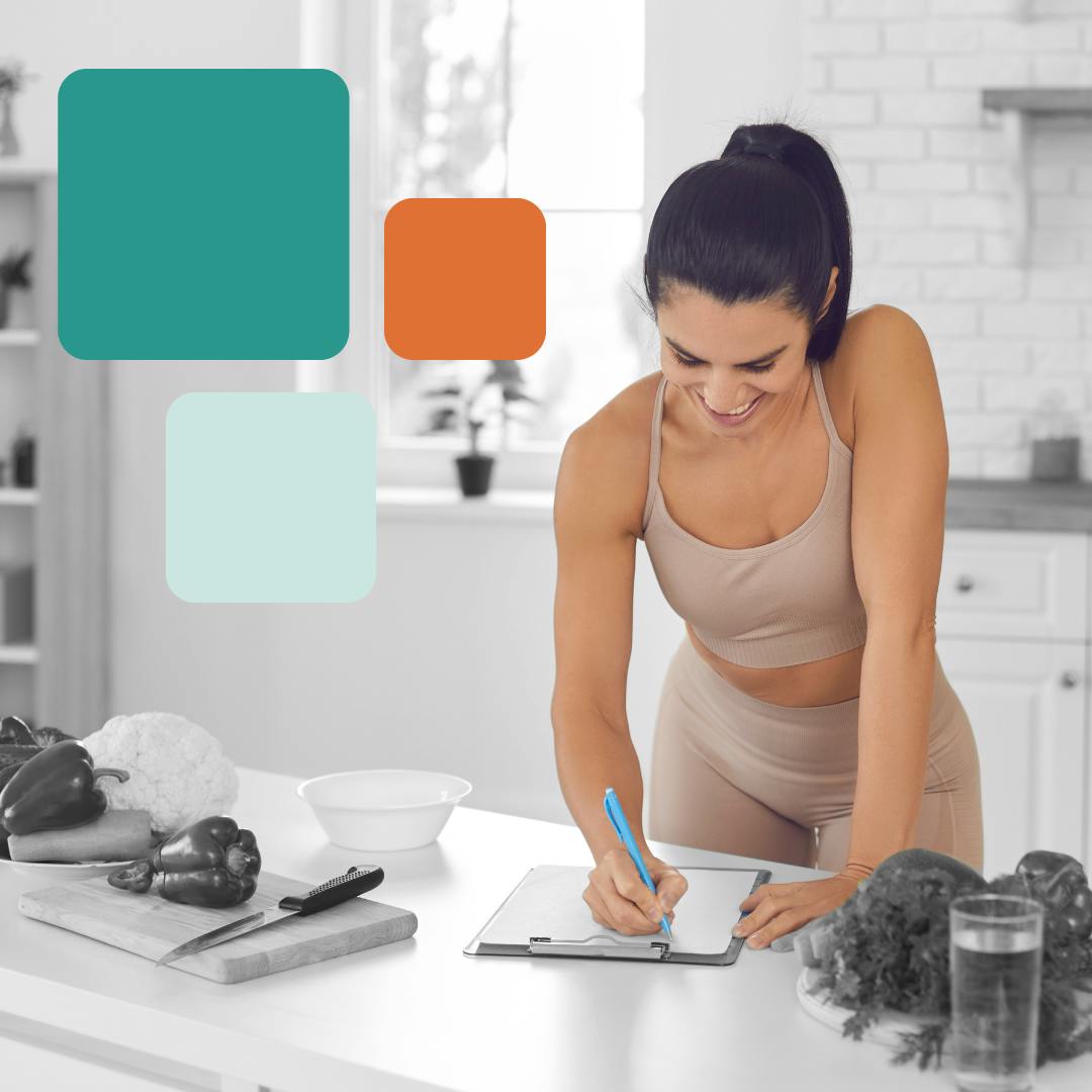 Women writing down New Years goals