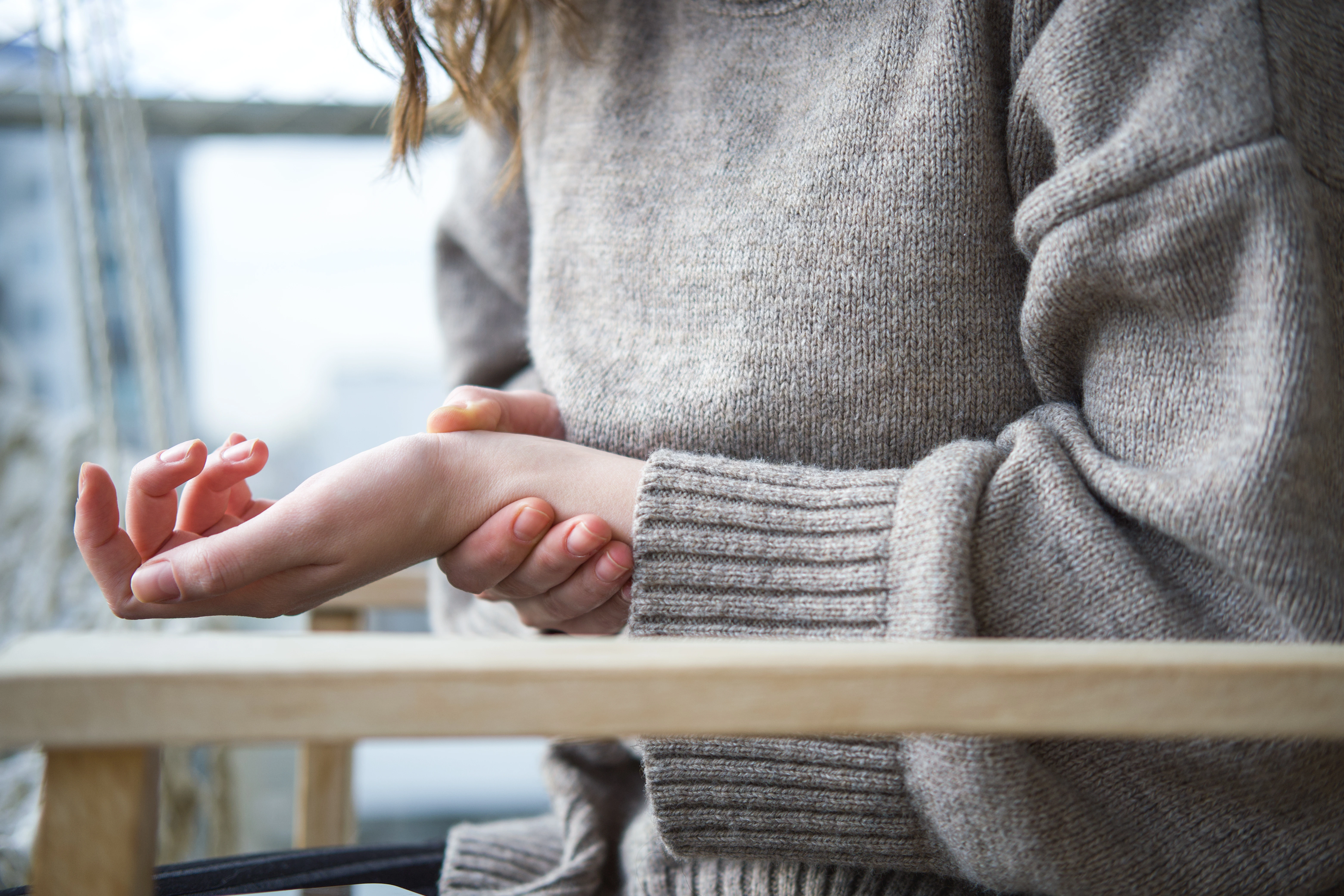 A female is experiencing neuropathy pain in her wrist. 