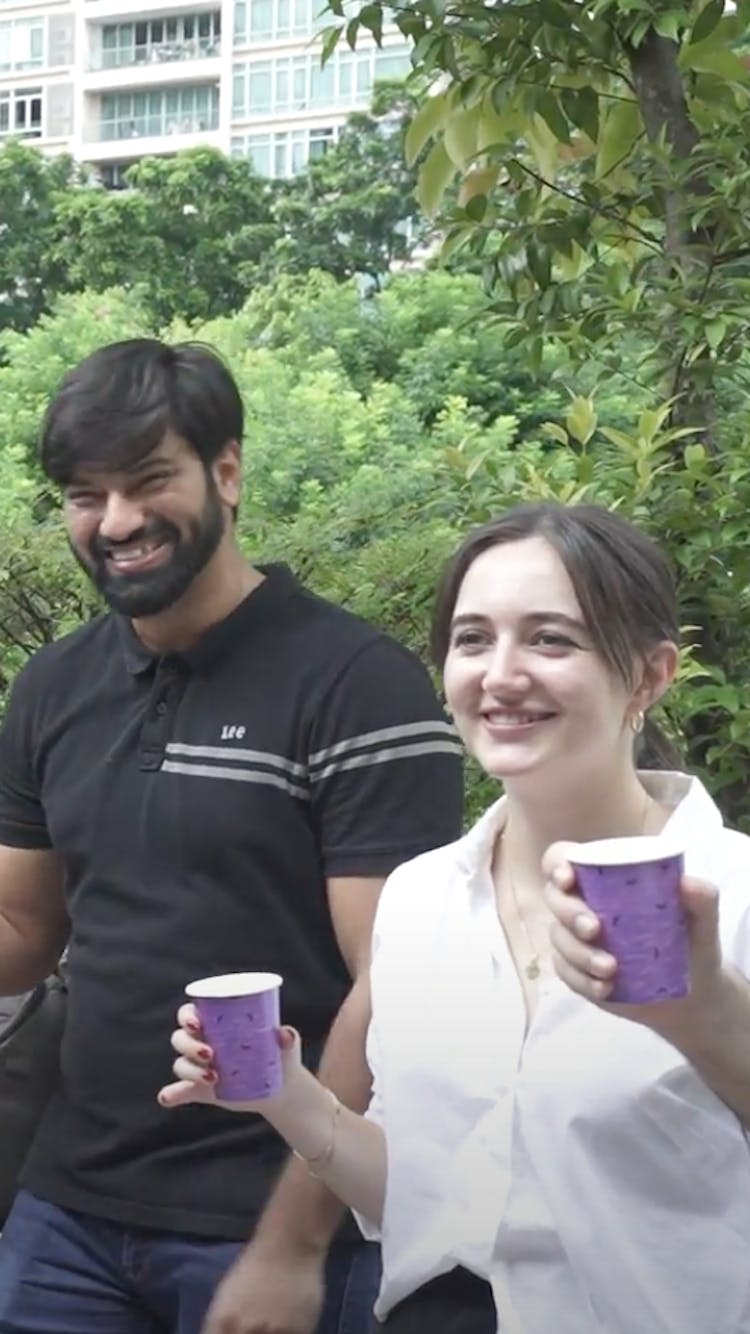 image Casa Mia members, cheering, drinks, outside, greenery