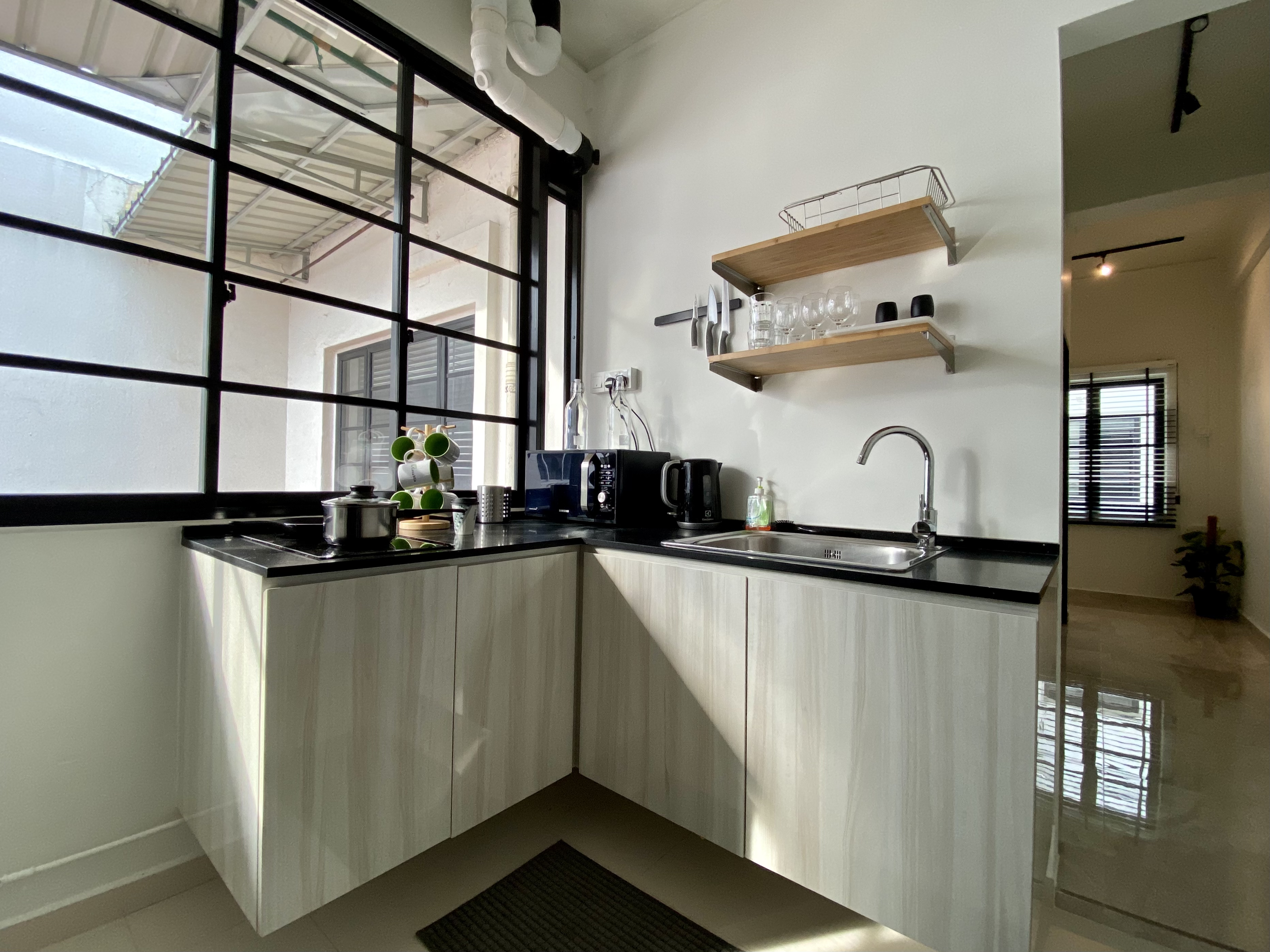 The kitchen at Casa Mia Tiong Bahru it's fully equipped