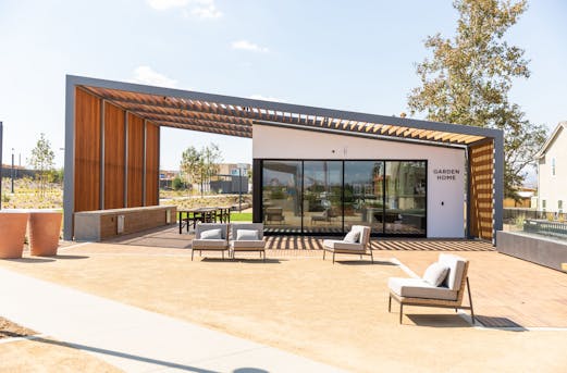 Garden building with exposed steel structure protected by beam galvanizing from Coatinc US, delivering corrosion resistance, longevity, and low-maintenance durability.