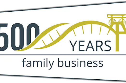 Badge highlighting over 500 years of family business tradition at Coatinc US