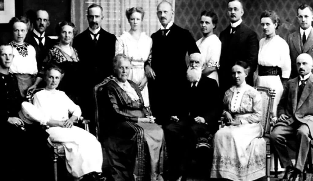 Founder of Coatinc with family members, historical company photograph.