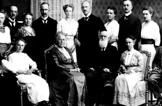 Founder of Coatinc with family members, historical company photograph.