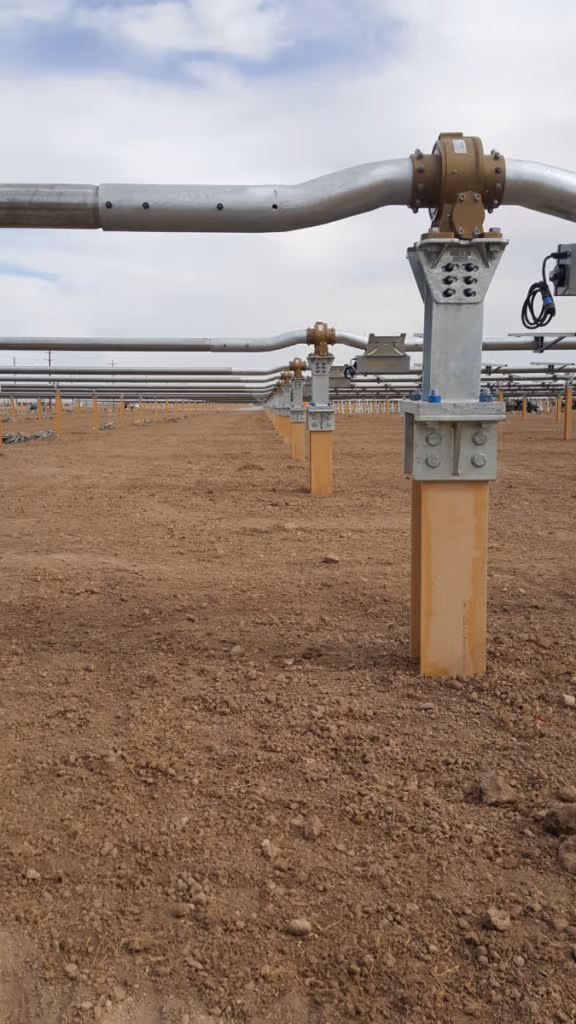 Base steel structure of an open-field solar park, featuring galvanized foundations and support systems for long-term corrosion protection by Coatinc US.