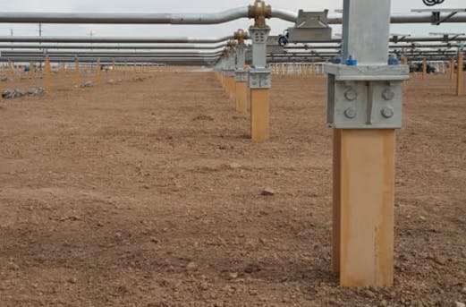 Base steel structure of an open-field solar park, featuring galvanized foundations and support systems for long-term corrosion protection by Coatinc US.