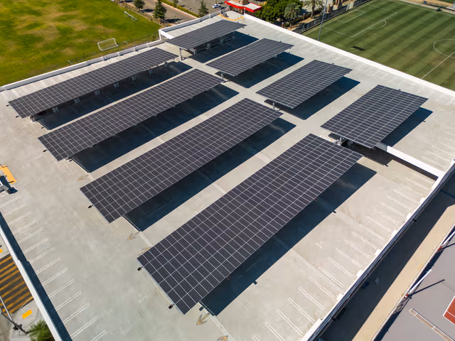 Extensive parking area featuring solar-equipped carports, protected with solar structures galvanizing by Coatinc US for long-term durability.